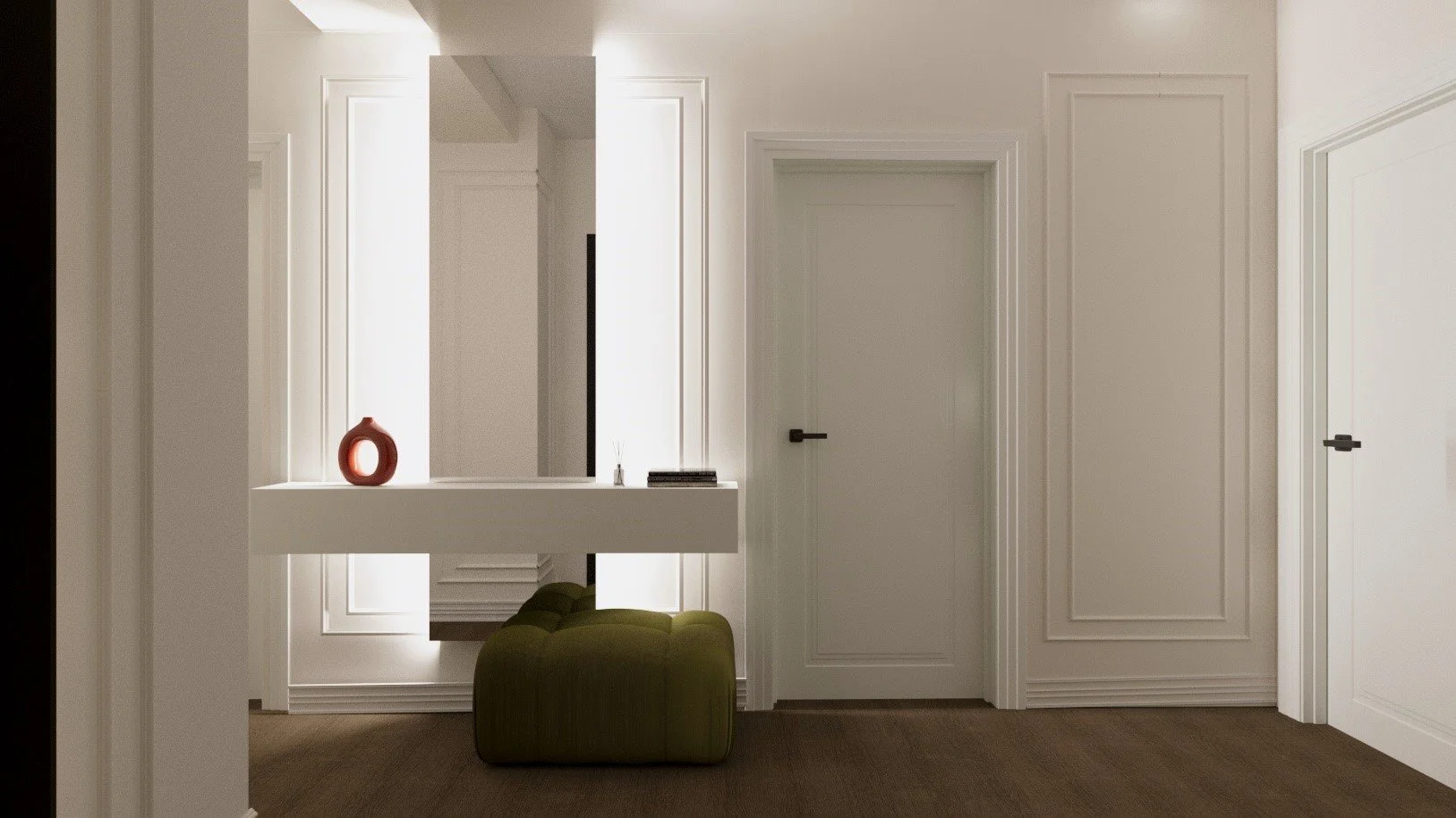 Interior of a modern, minimalist room with white walls and doors, a green upholstered ottoman, and a white floating shelf with a decorative red vase, a small diffuser, and a stack of books.