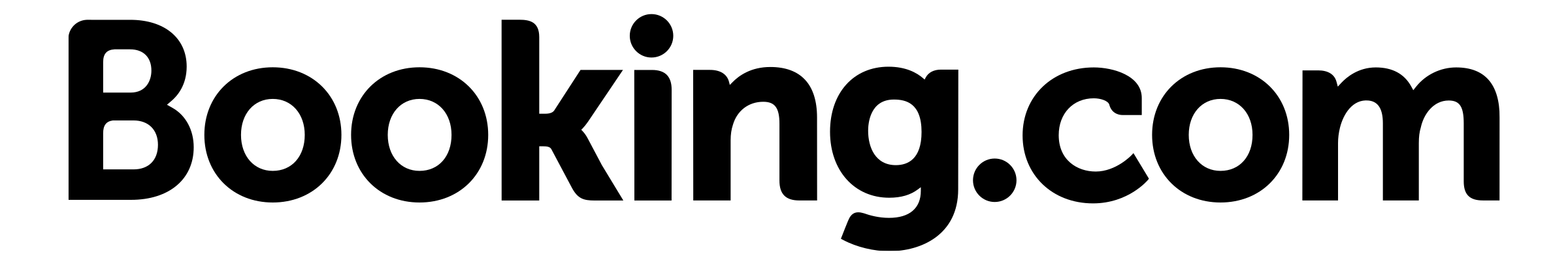 Close-up of a mother cat with orange and white fur cuddling her kitten in a basket.