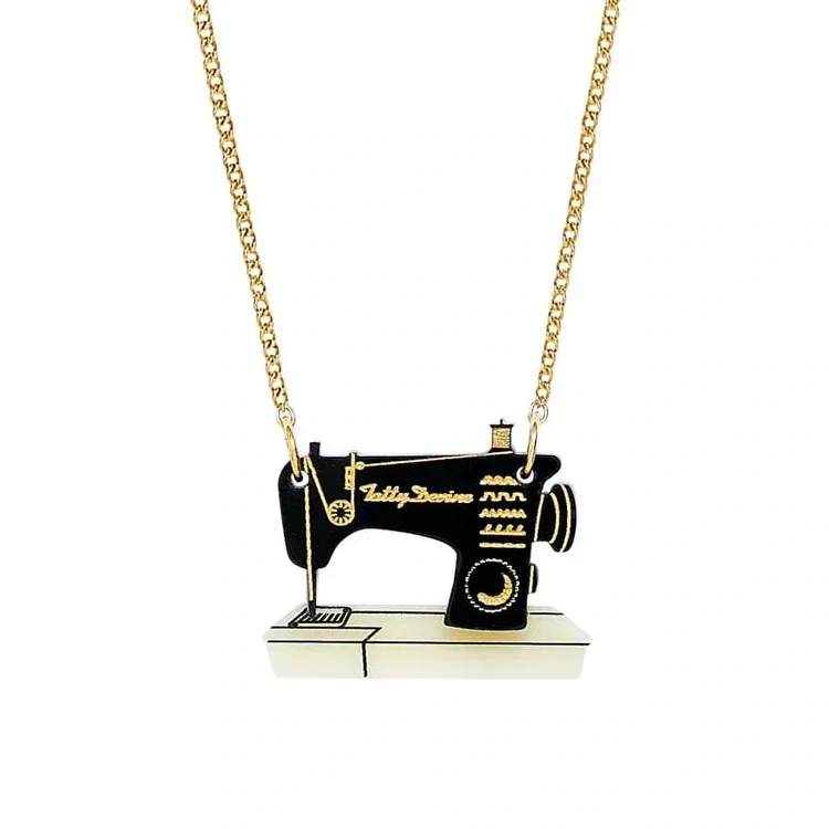 mini-sewing-machine-necklace-recycled-tatty-devine-32134908117040.webp