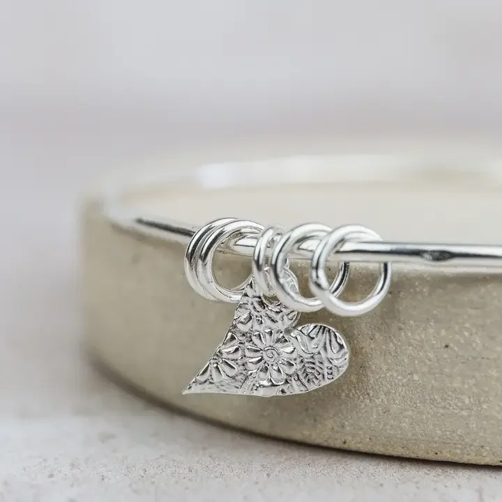 Lucy Kemp Sterling Silver Textured Tilted Heart Charm Bangle