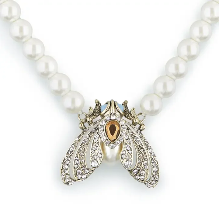 Bill Skinner Moth Statement Necklace Cream Pearl