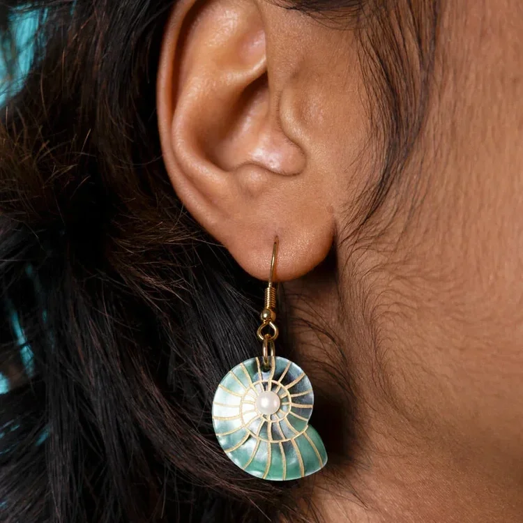 Spiral-Shell-Earrings-Green-Pearl-Closeup.webp