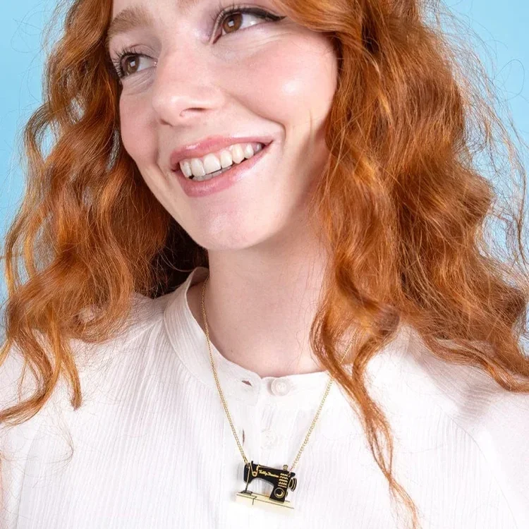 mini-sewing-machine-necklace-recycled-tatty-devine-33205284962352.webp