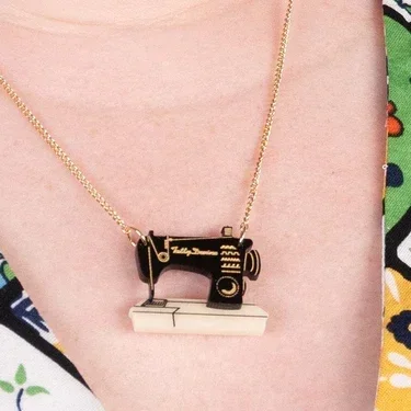 mini-sewing-machine-necklace-recycled-tatty-devine-32132117463088.webp