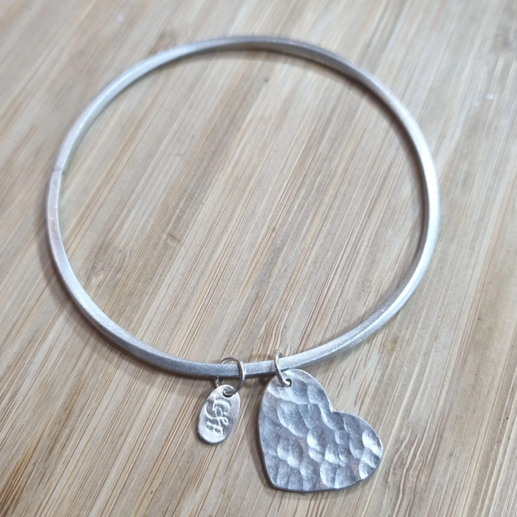Chambers & Beau Twisted Bangle Textured Heart