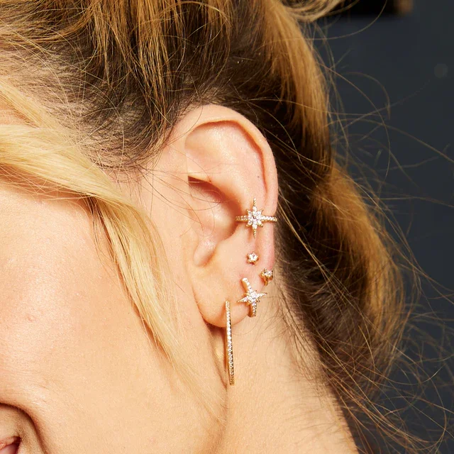 gold-celestial-ear-stack-starburst_2_0167db71-1ad7-429d-ab92-c30c0e2f8823.webp