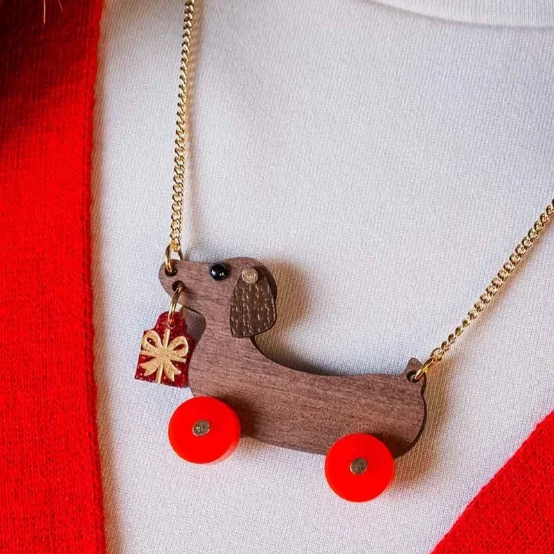 Dog_on_Wheels_Present_Necklace_1.webp