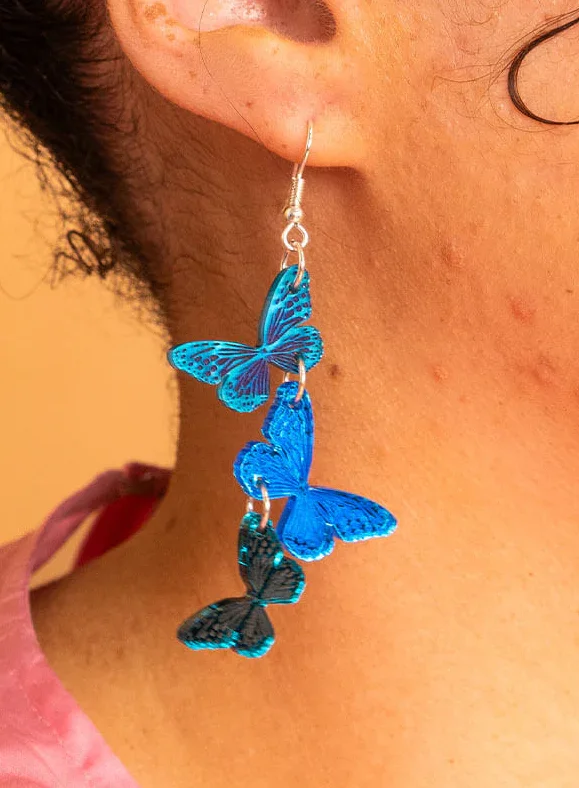 Blue-Butterfly-Earrings-Closeup.webp