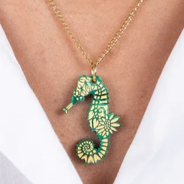 seahorse-pendant---green-pearl_b149d696-50e2-4323-a31e-67a897bcc7df.webp