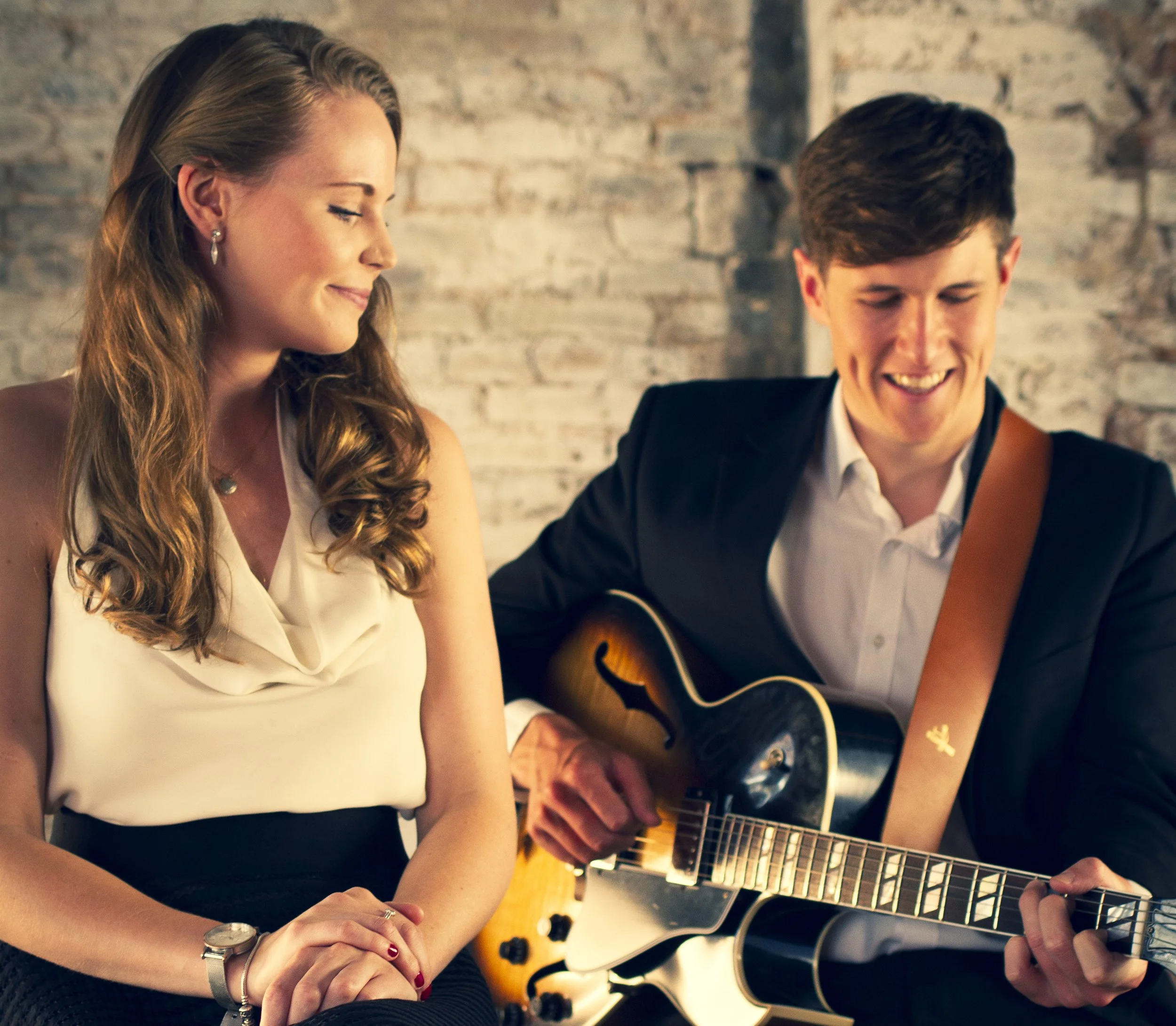 Kay from Sing with Kay and guitarist performing as Kay Acoustic, an acoustic duo for weddings and events