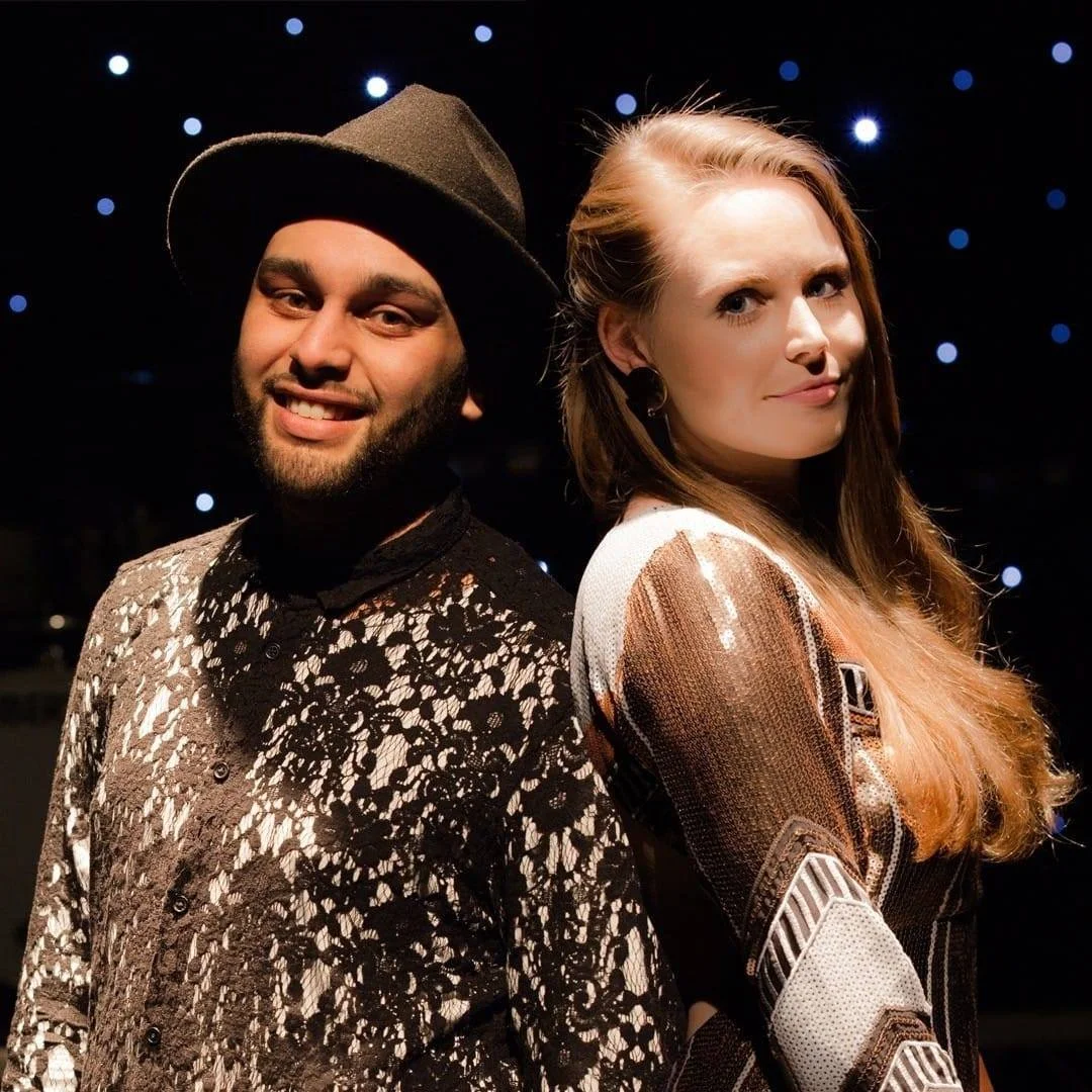 Kay from Sing with Kay and vocalist Corey back-to-back for Luna Sounds Entertainment band promo image, Leicester acoustic duo featured in YouTube video with over 250,000 views