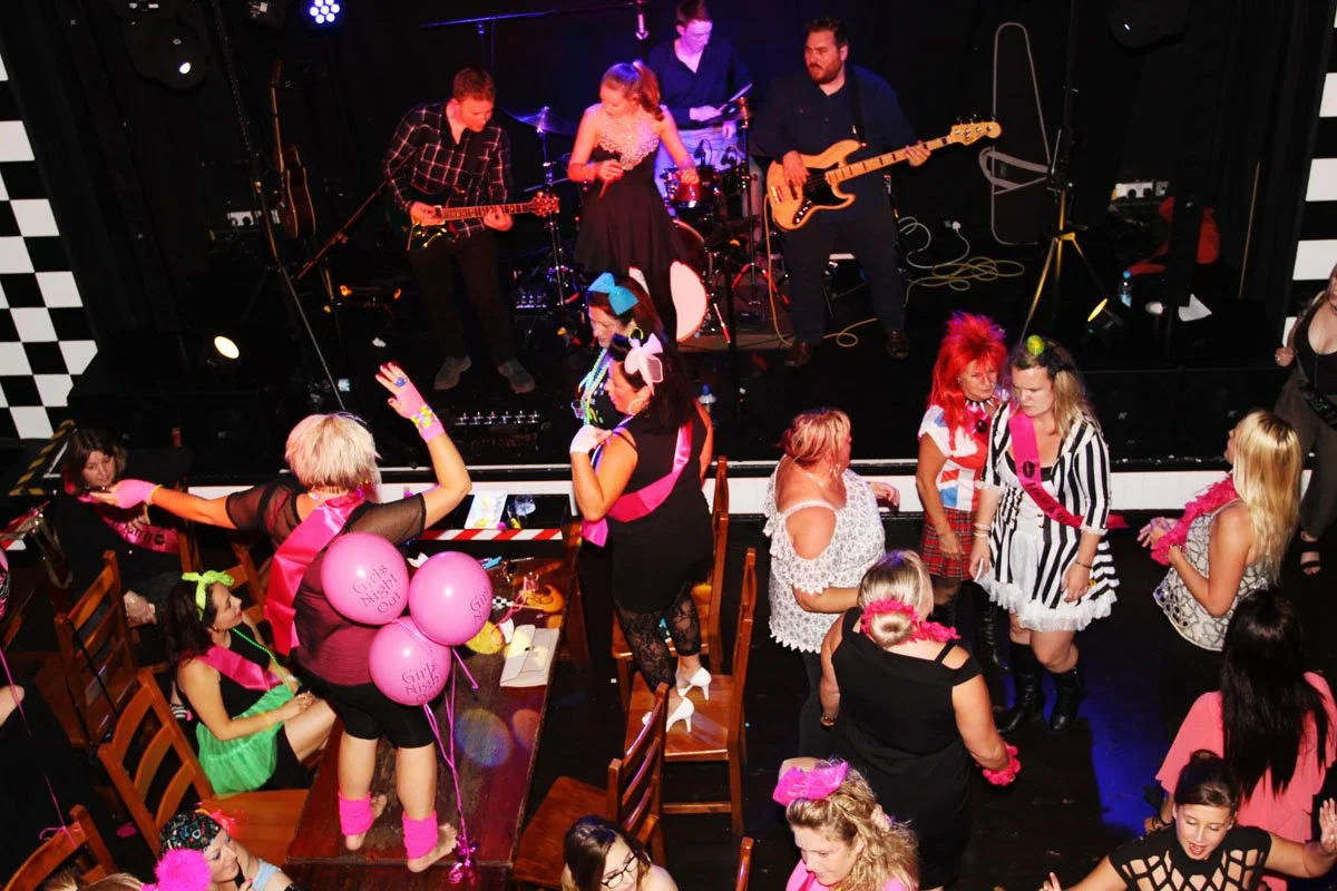 Kay from Sing with Kay performing live with band at Bistro Live in Leicester, venue known for Bongo Bingo, showcasing live music and singing