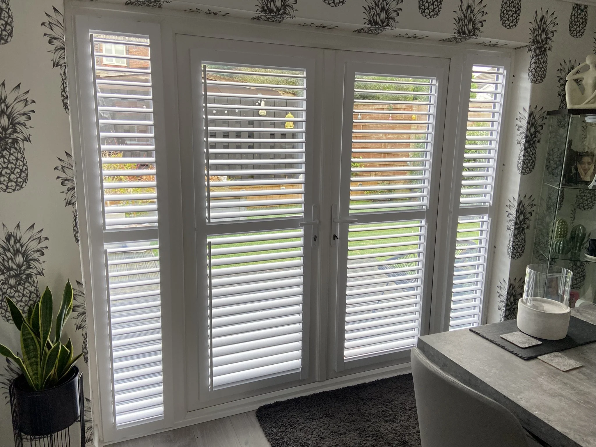 Perfect Fit shutters fitted to French doors in Worsley from Inside
