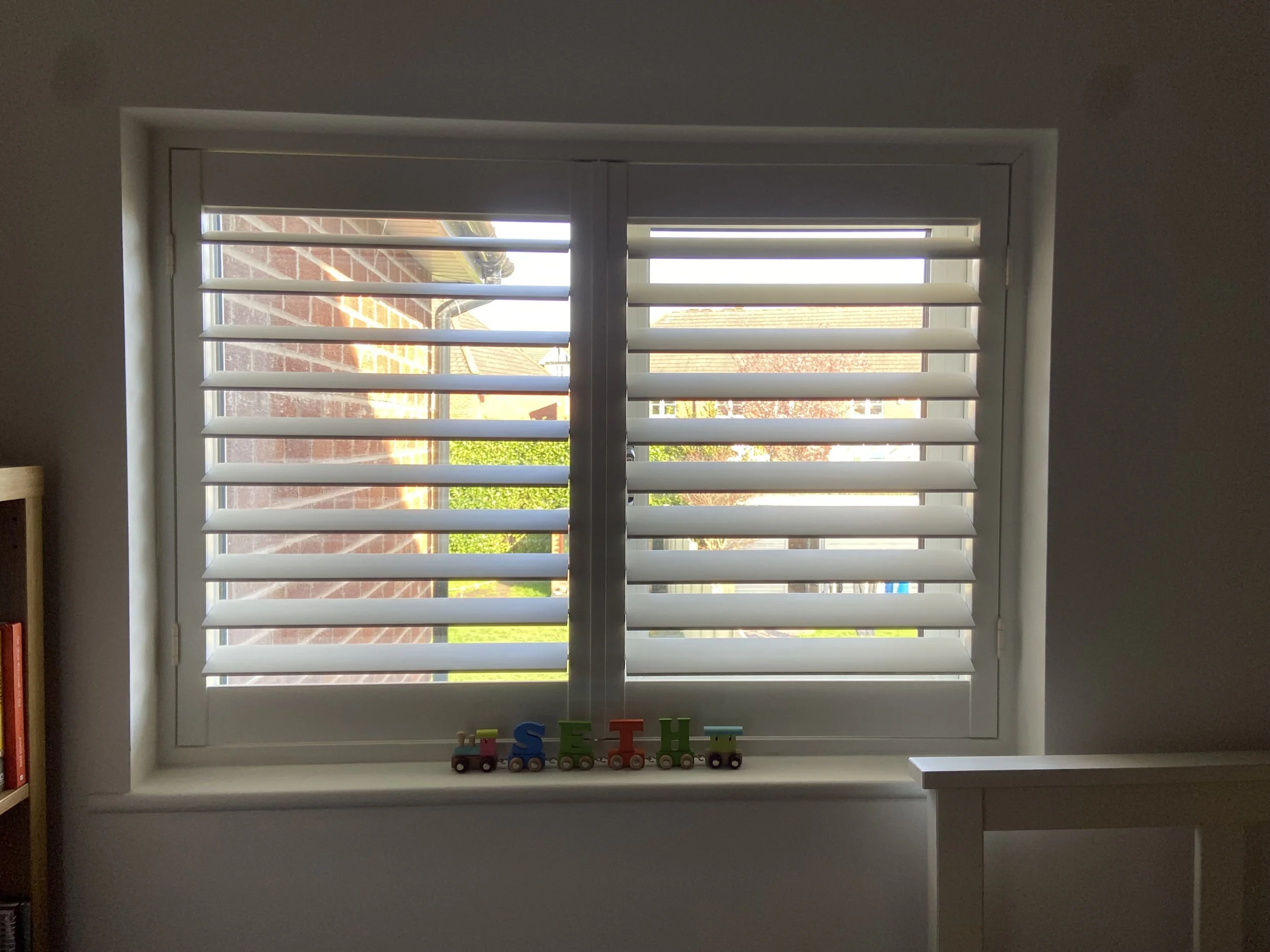 Hardwood Shutters fitted in bedroom window in Winwick