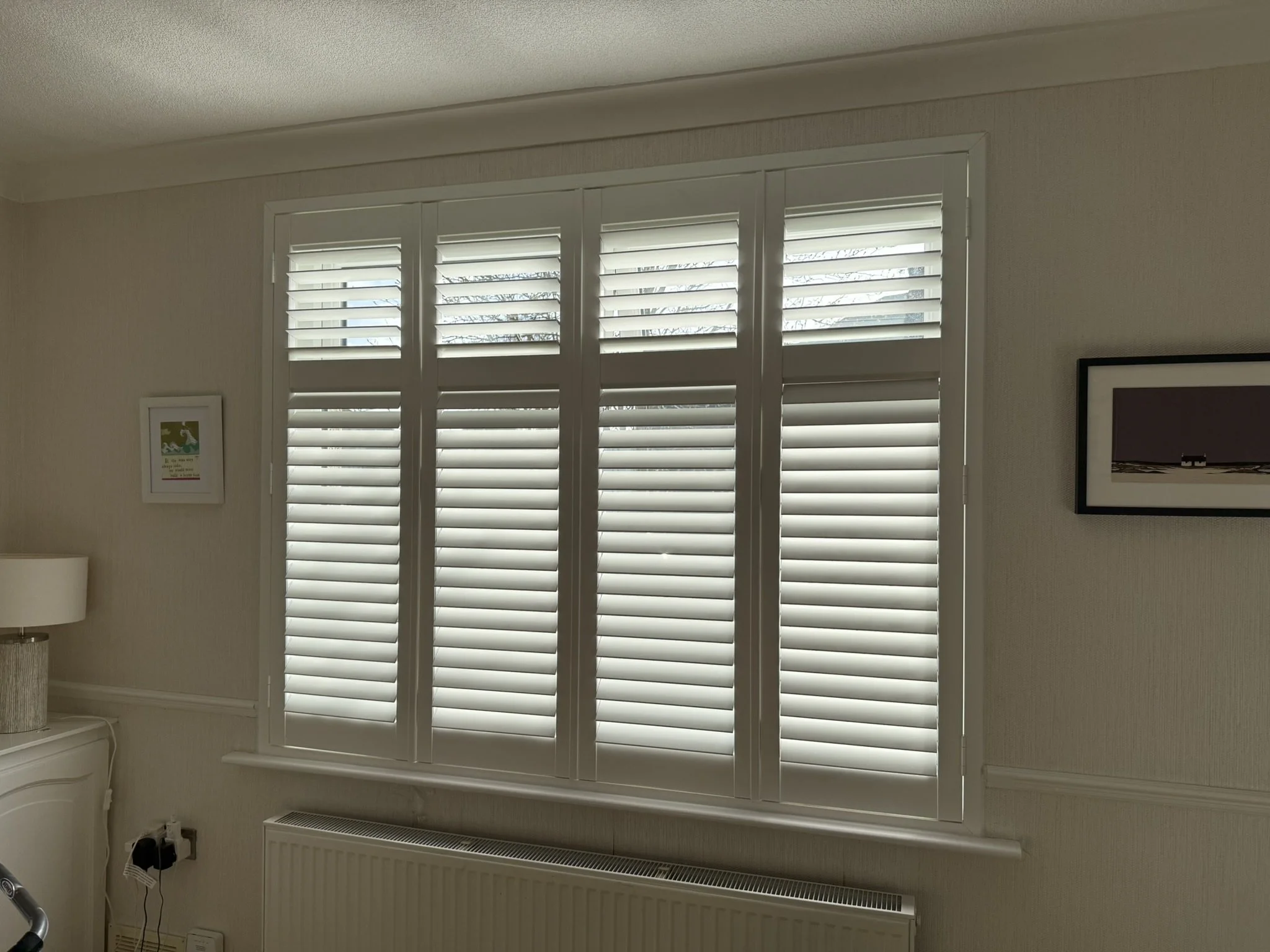 Wooden Shutters fitted to a large window in Golborne