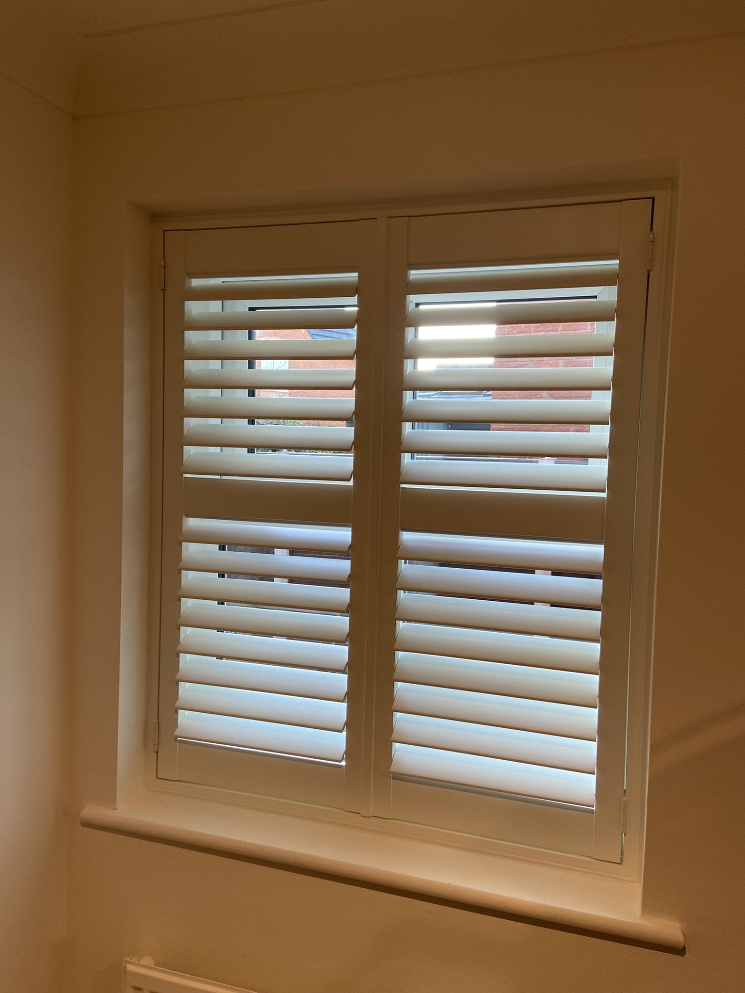 Poly Vinyl Shutters fitted to a House in Lowton