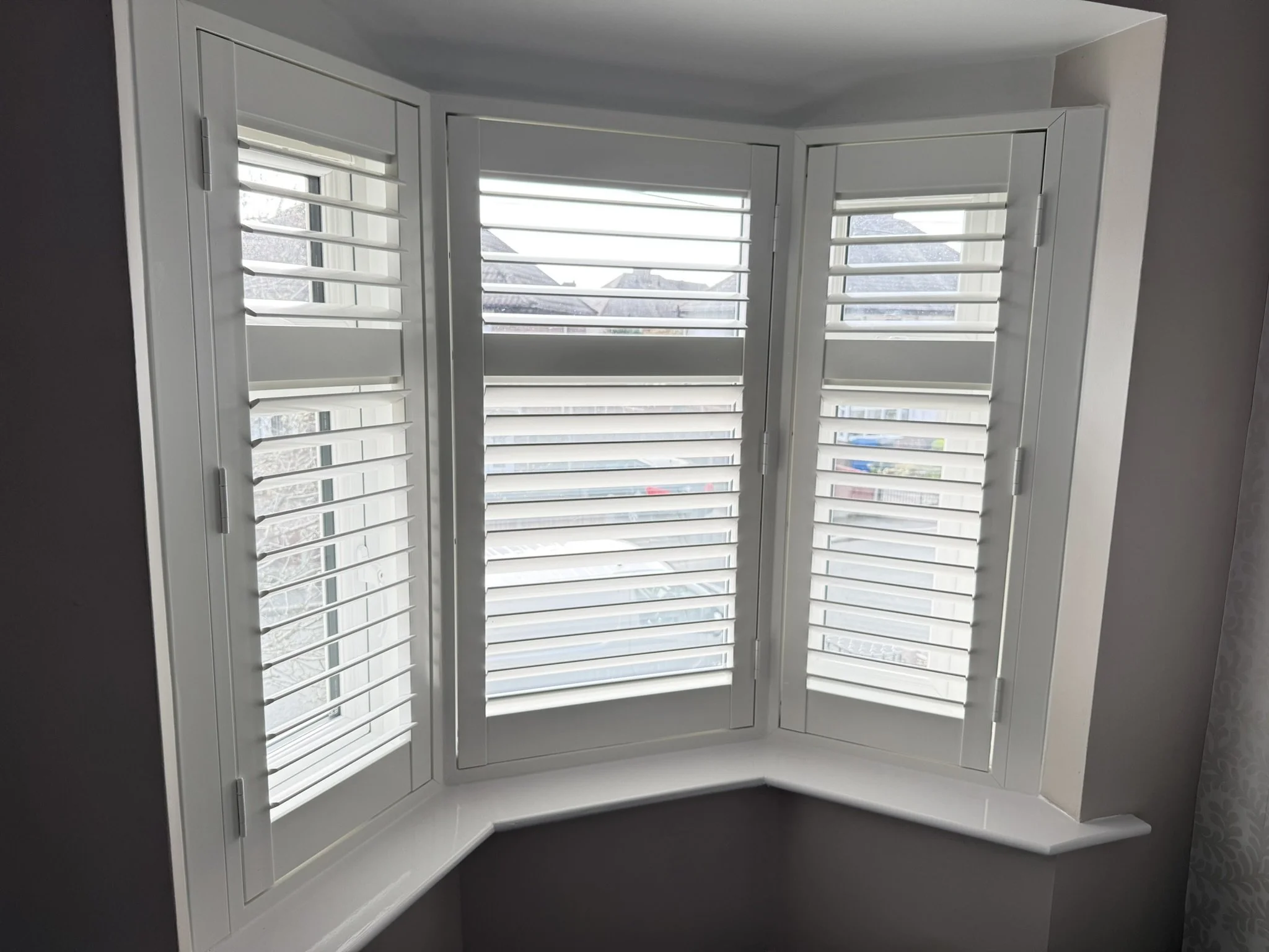 Bay window Shutters fitted to a Lounge bay window in Altrincham