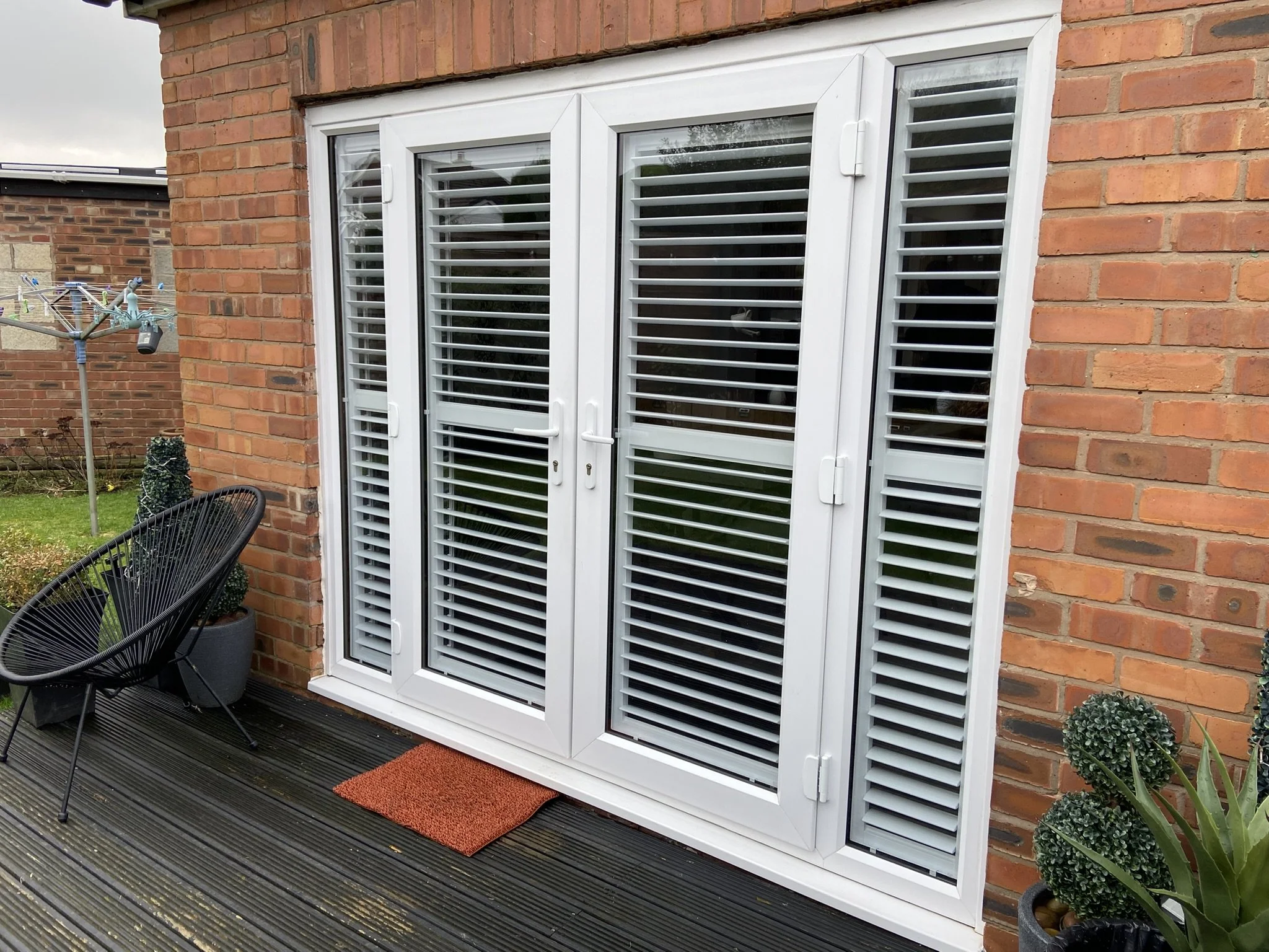 Perfect Fit shutters fitted to French doors in Worsley from Outside
