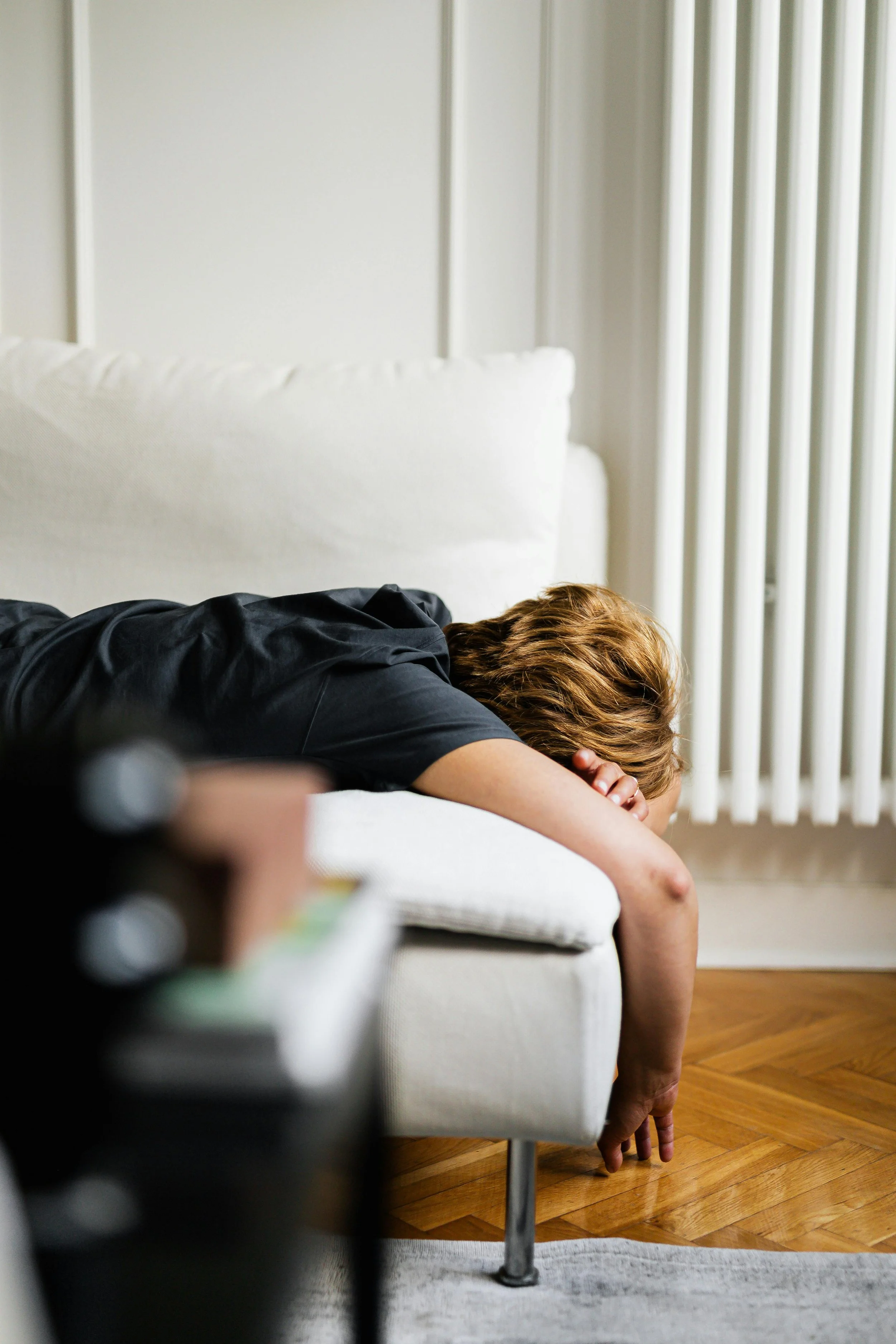 Editorial-style image exploring nervous system overload, emotional exhaustion, and chronic activation under modern pressure.