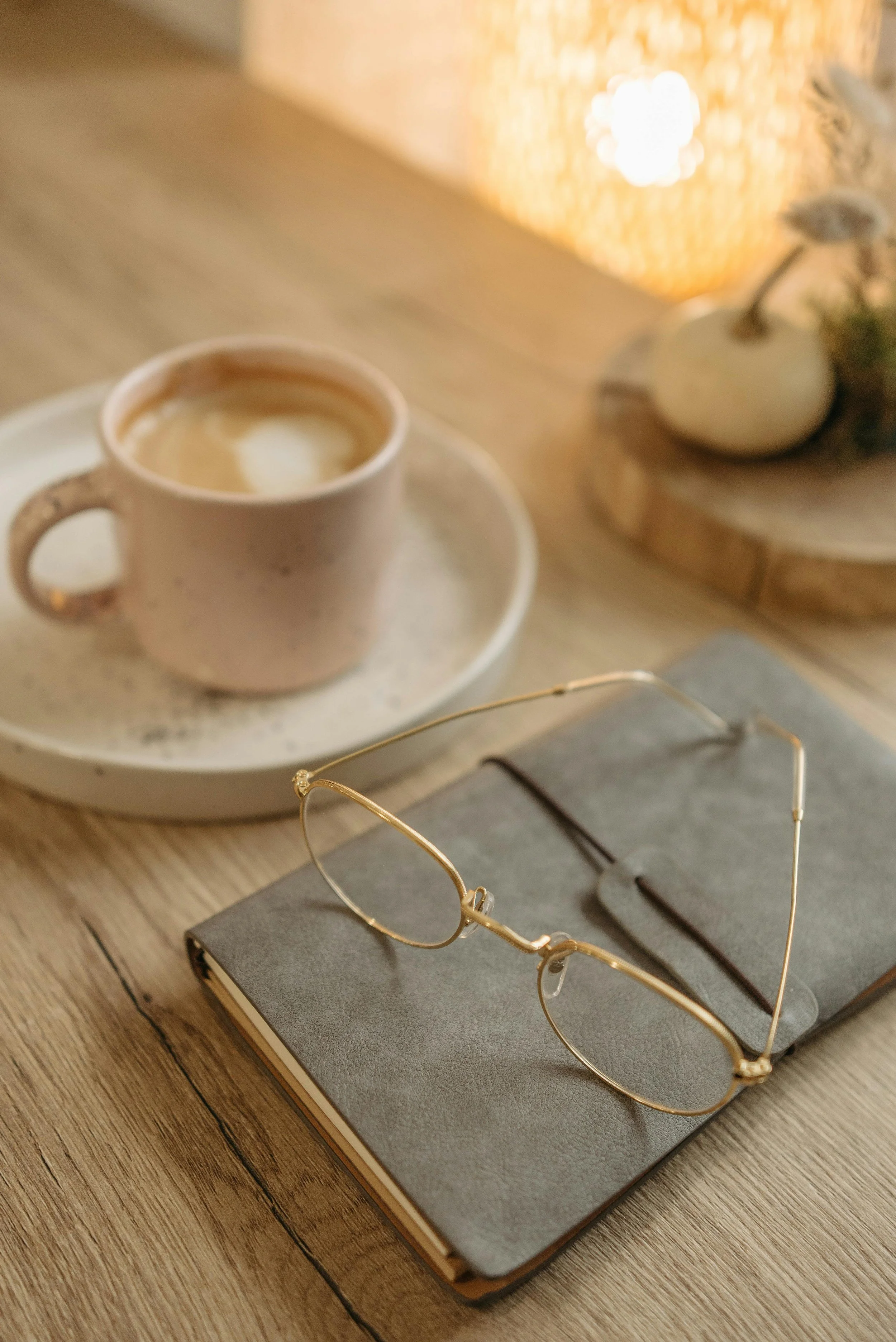 writing in a journal at home in soft natural light - tips for not overthinking