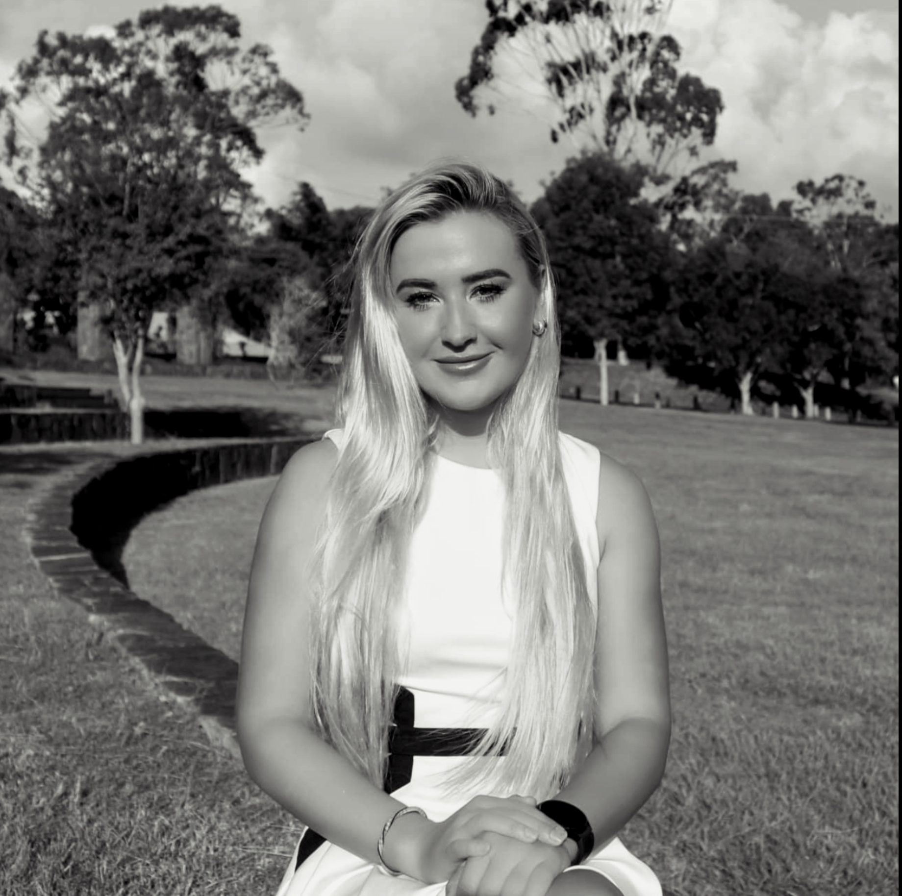 woman smiling in park - psychotherapy and counselling - nature - becoming on point gabrielle headshot