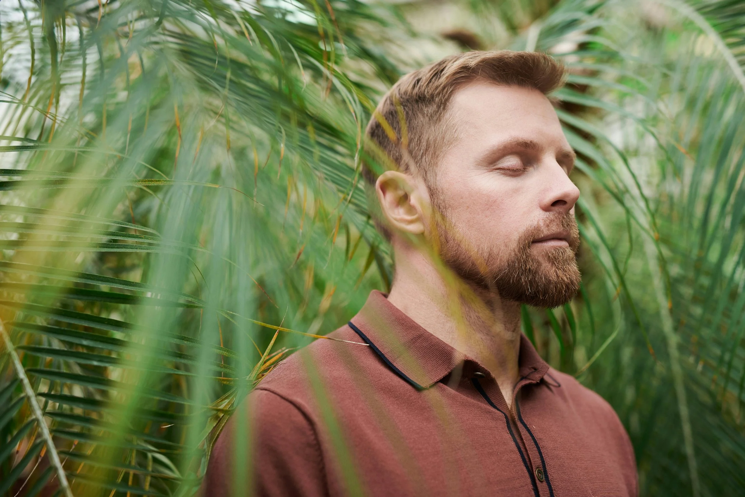 man standing in nature to calm himself - mindfulness, nature, walk to help stop overthinking - psychological strategy - becoming on point