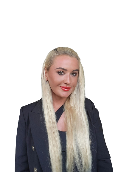 A woman with long blonde hair wearing a dark blazer and a matching top, smiling at the camera against a plain white background. Gabrielle-Beth Volovsky, counsellor, psychotherapist and performance coach.