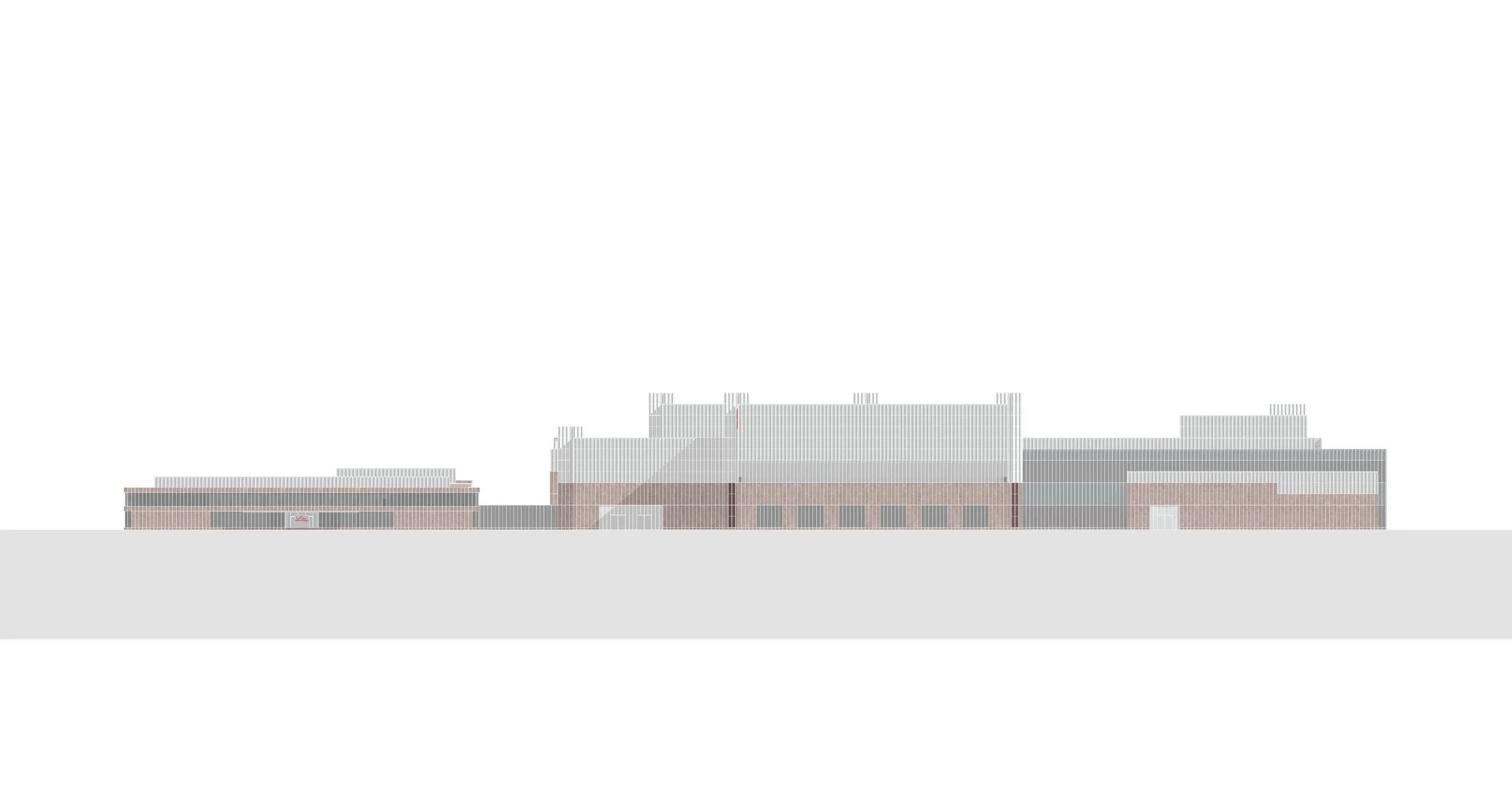 A large, modern building with multiple tiers and a variety of window arrangements, featuring sections with industrial-style design elements.