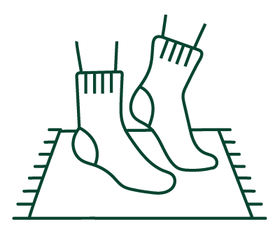 Illustration von Socken auf Teppich, für Wohlfühlatmosphäre