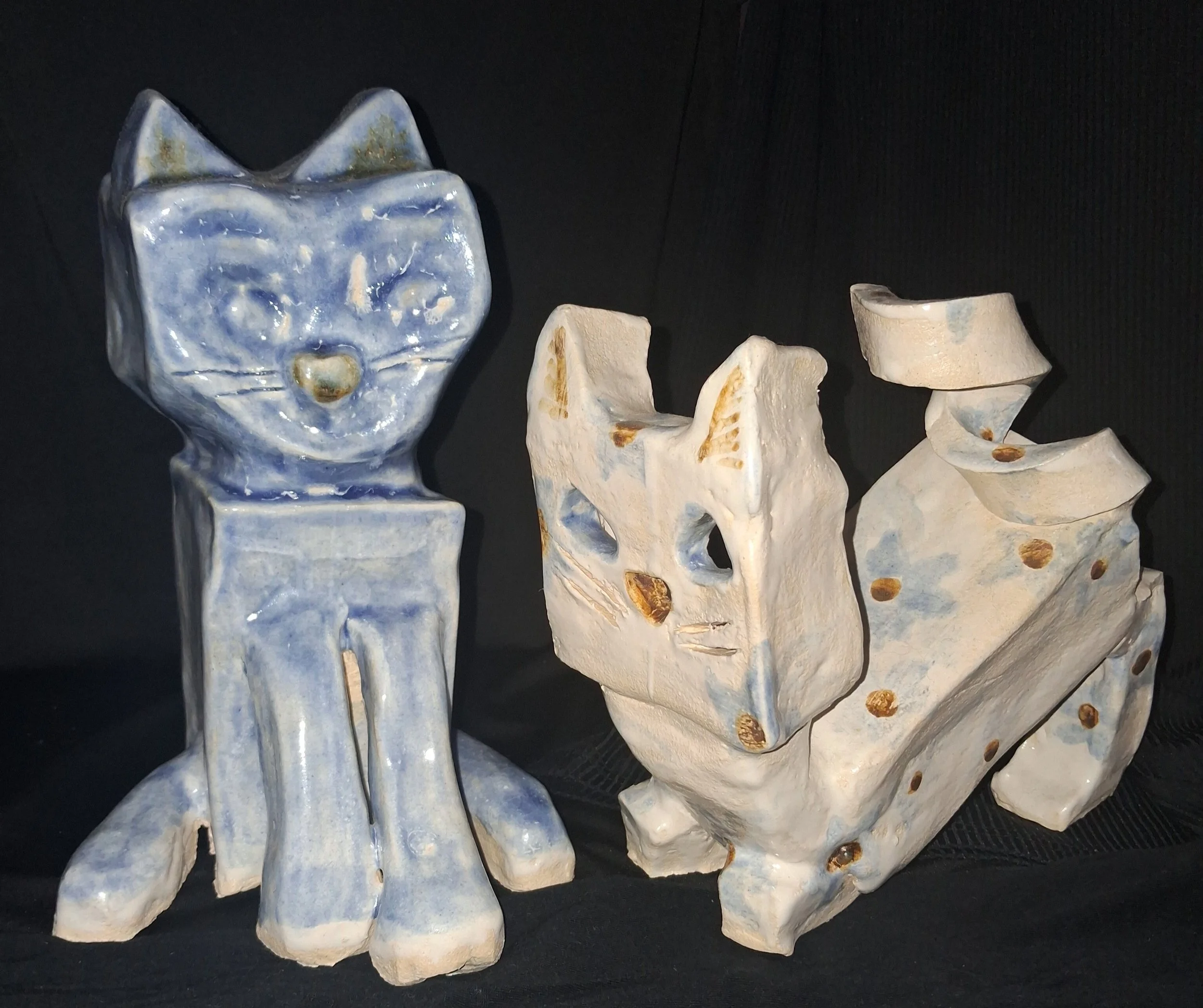 Square Cats In A Round Hole, 
Photo One,
Kathryn Guy, Glazed Ceramics, 26cm by 19cm (Piece one), 21cm by 27cm (Piece two), 2024