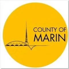 Logo of County of Marin featuring a yellow background, a black outline of a bridge and a tall spire, with the text 'County of Marin'.