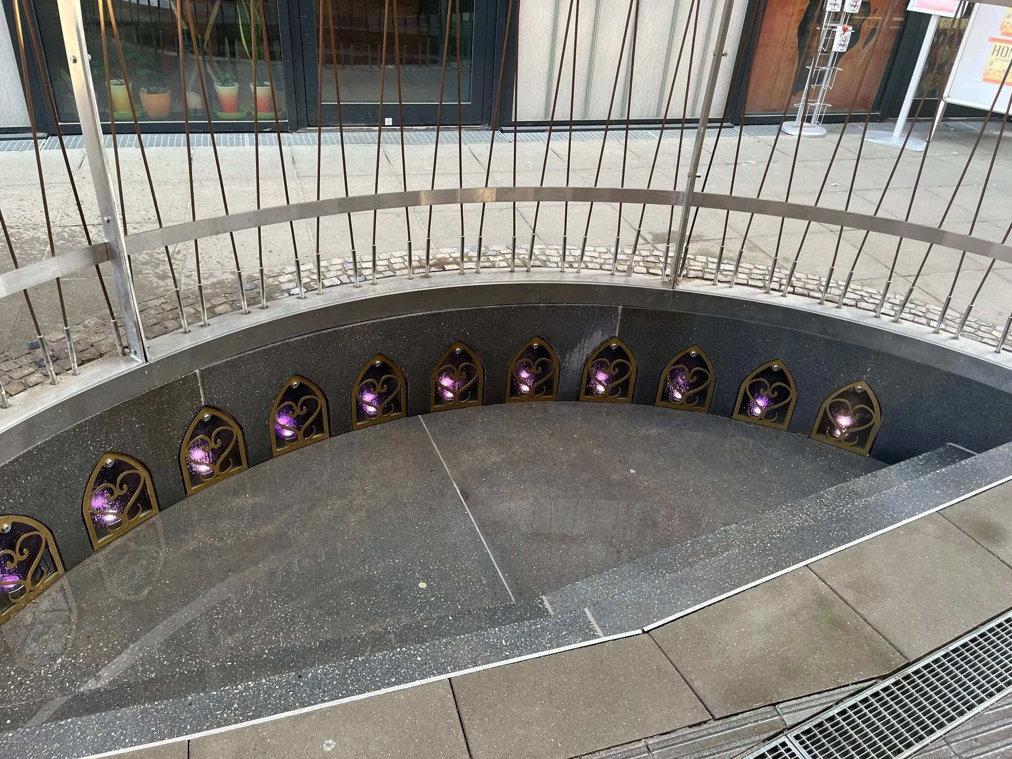 EartNest detail

12  underground niches containing 12 urns with ancestral soils from former European Colonies
https://www.berlin-global-village.de/en/dekoloniales-denkzeichen/media/