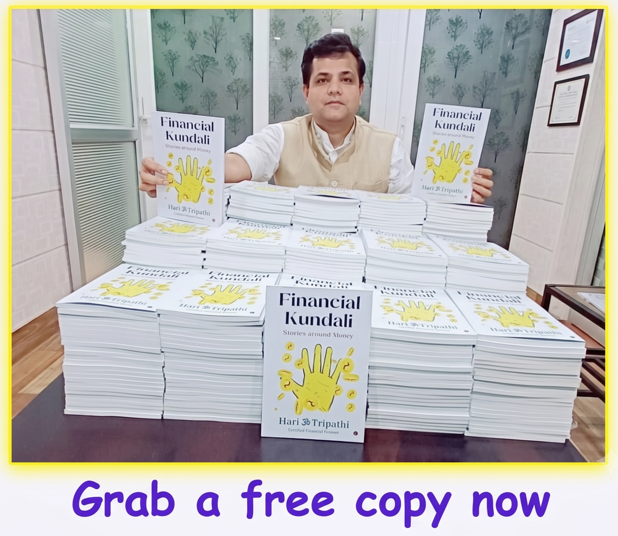 A man sitting behind a table displaying numerous copies of a book titled 'Financial Kundali' by Hari S Tripathi, with shelves and wall decorations in the background, and a sign in front of the table encouraging to 'Grab a free copy now.'