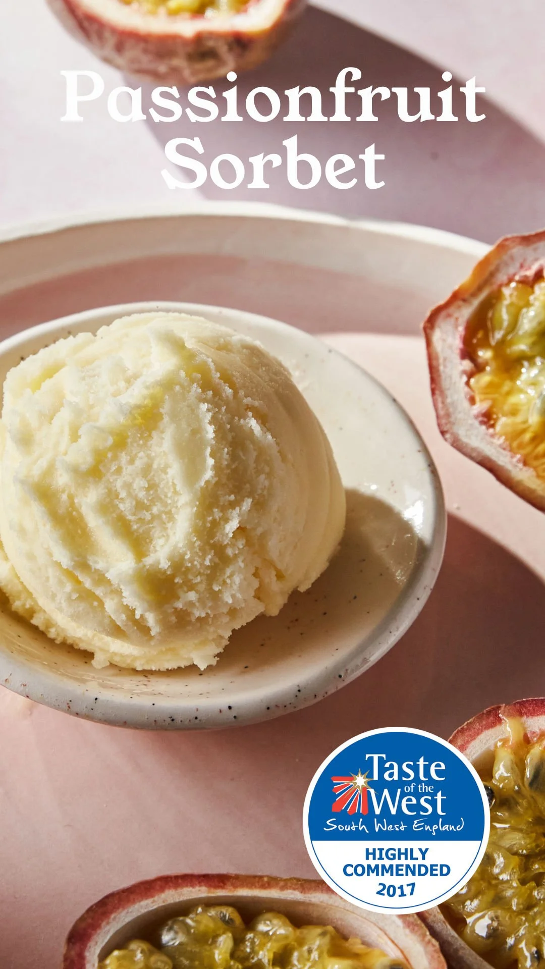 A bowl of passionfruit sorbet with halved passionfruits on a pink background, featuring the Taste of the West logo and text indicating it was highly commended in 2017.