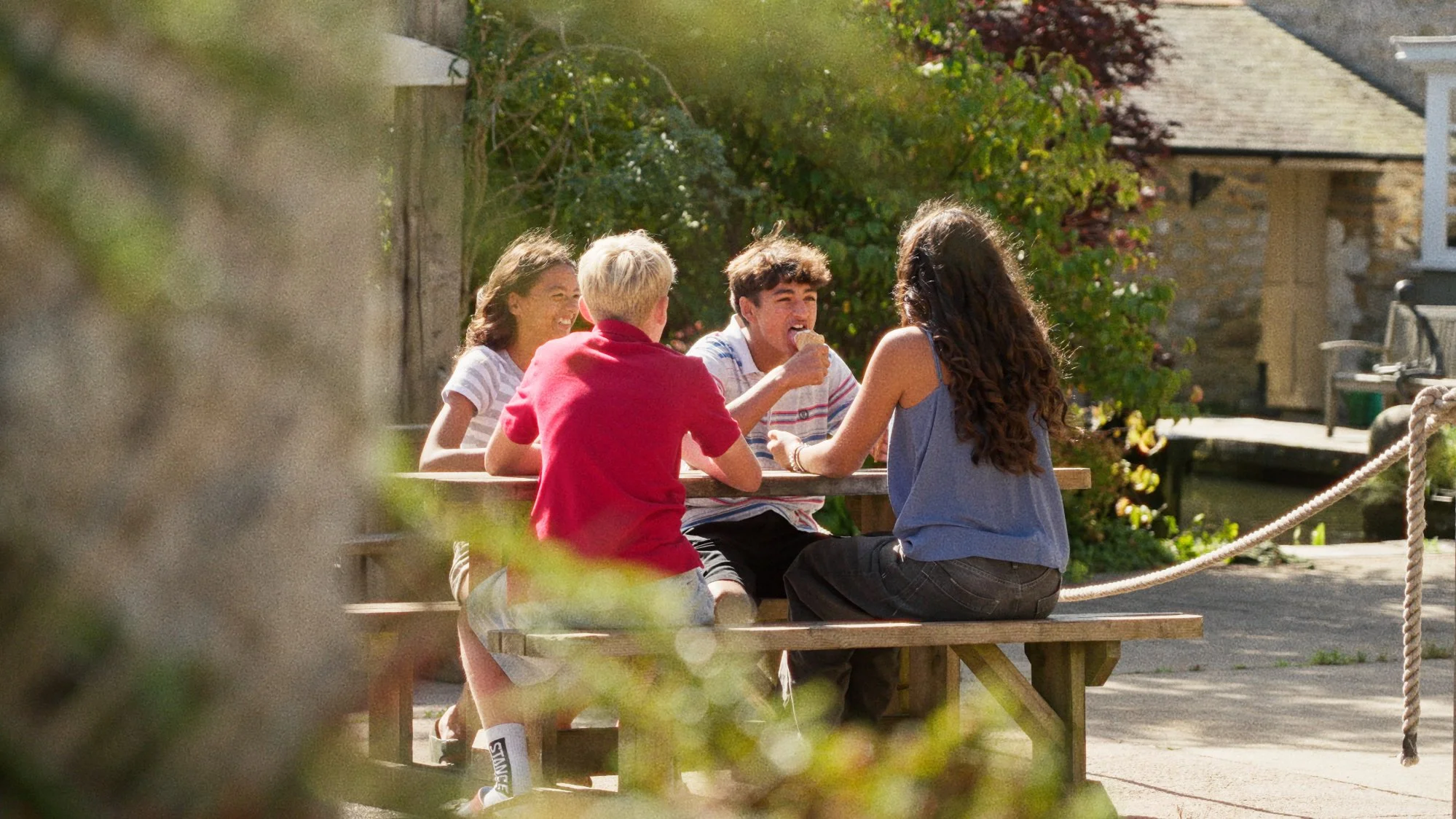 A family enjoying Cornish ice cream at Callestick Parlour