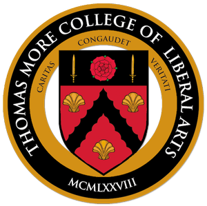 Seal of Thomas More College of Liberal Arts featuring a black and gold shield with red and gold emblems, surrounding text with the college's name and founding year, 2018.