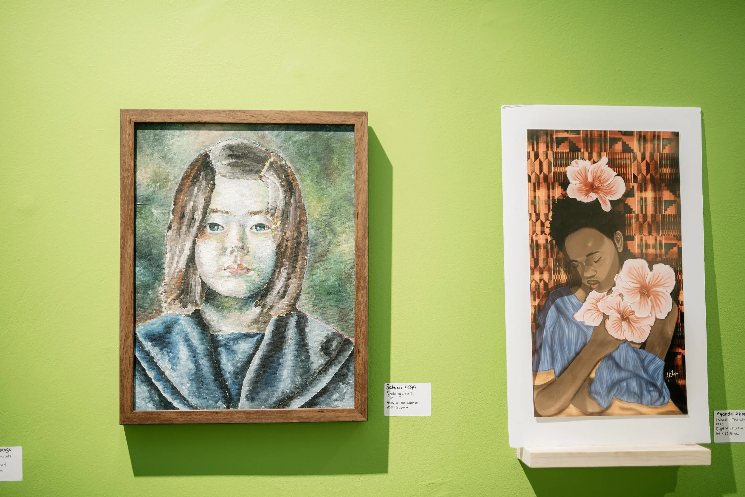 Two portraits of women displayed on a bright green gallery wall. The left portrait is a painting of a girl with brown hair, blue eyes, and a blue top. The right portrait is a digital illustration of a woman with dark curly hair, closed eyes, and flow