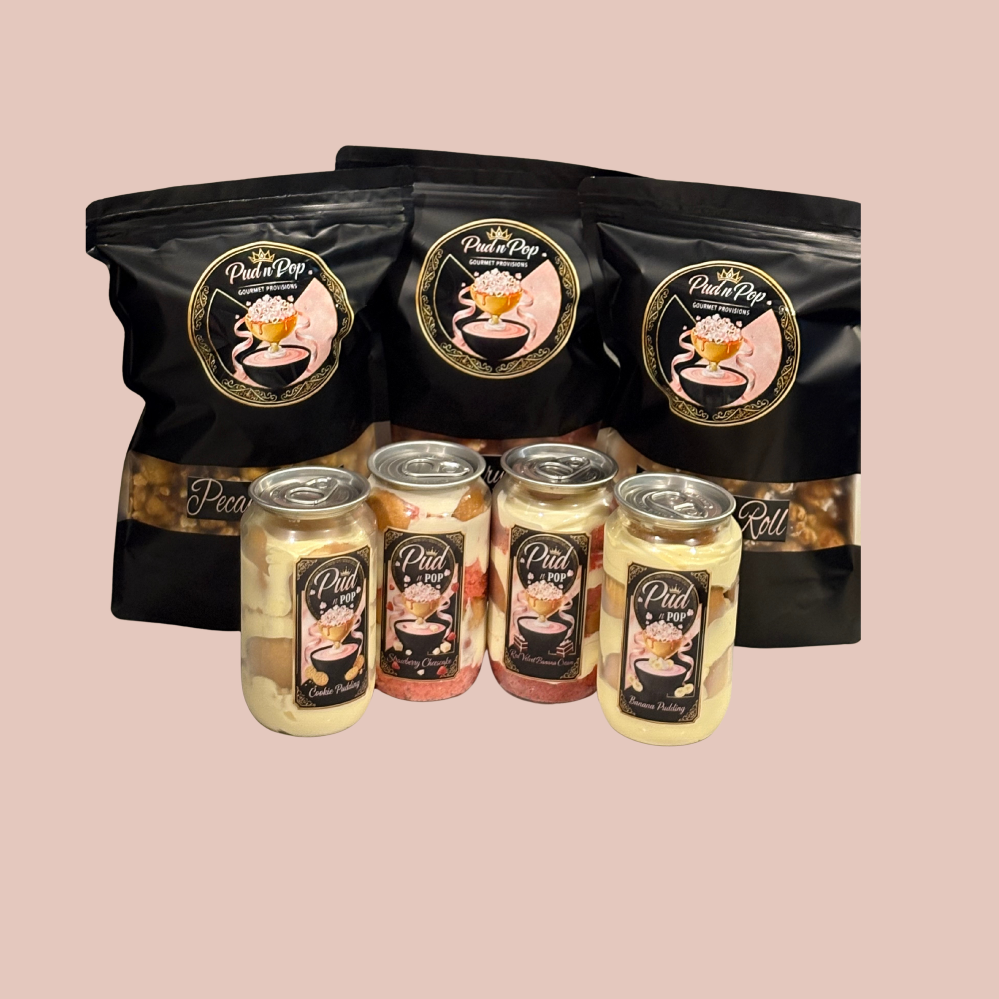 Assorted popcorn products, including black bags and canned puddings with labels, arranged on a pink background.