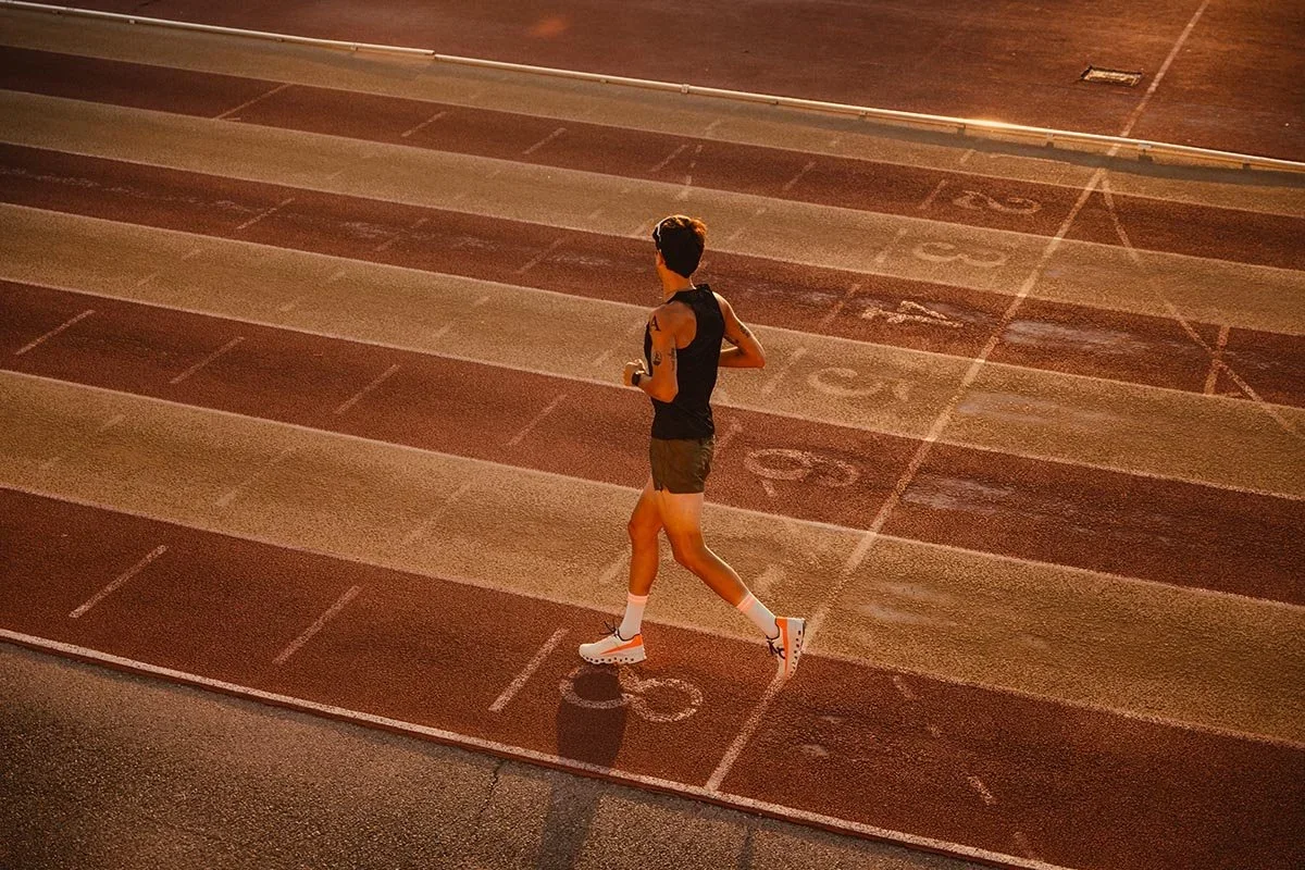 A male runner, shot at sunrise, at a running track in Girona, Spain shot for Black Sheep Sportswear campaign.