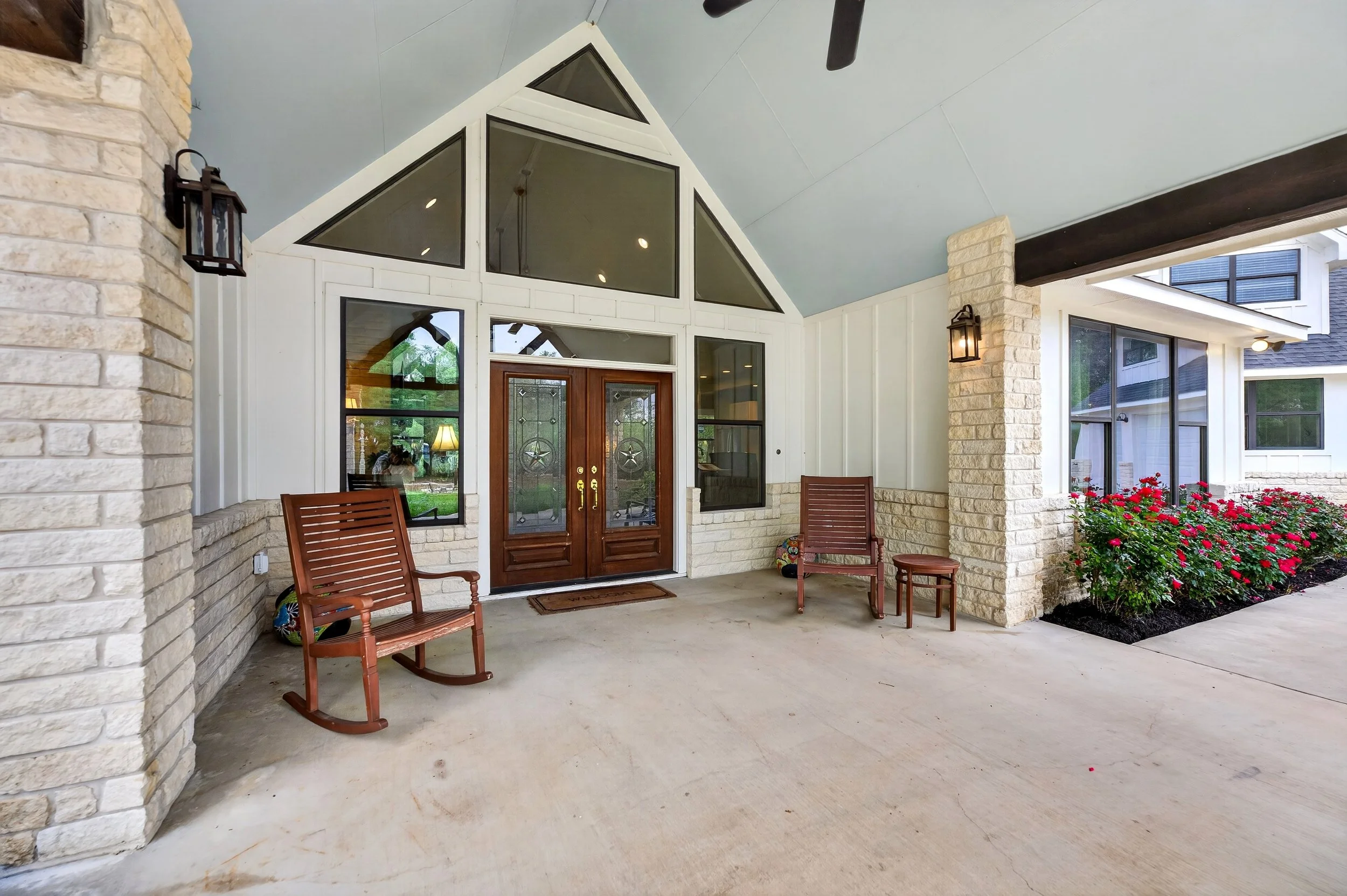 Expansive covered entry with porte cachere.