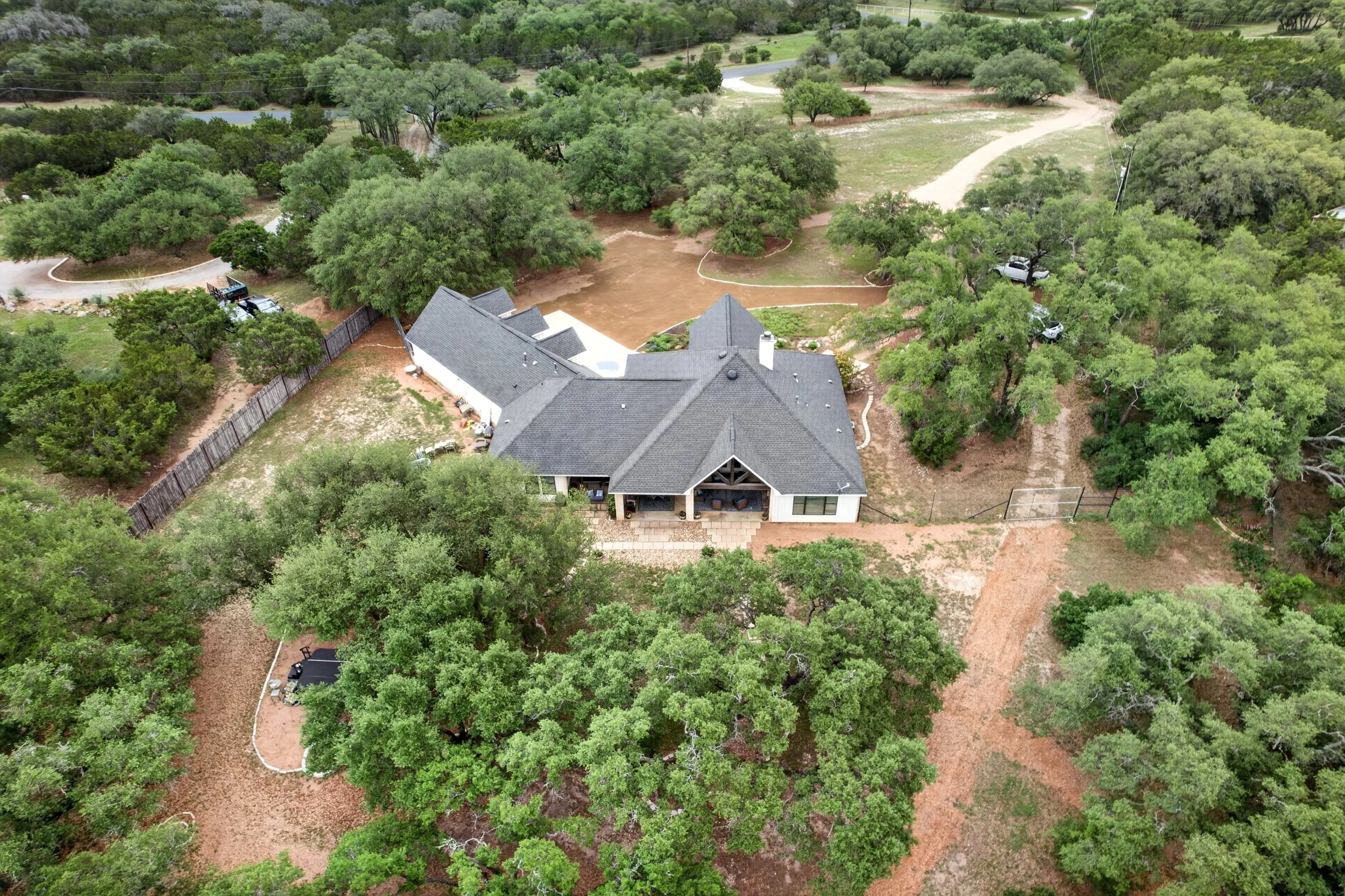 With a fully high fenced 2.5-acre+- backyard.