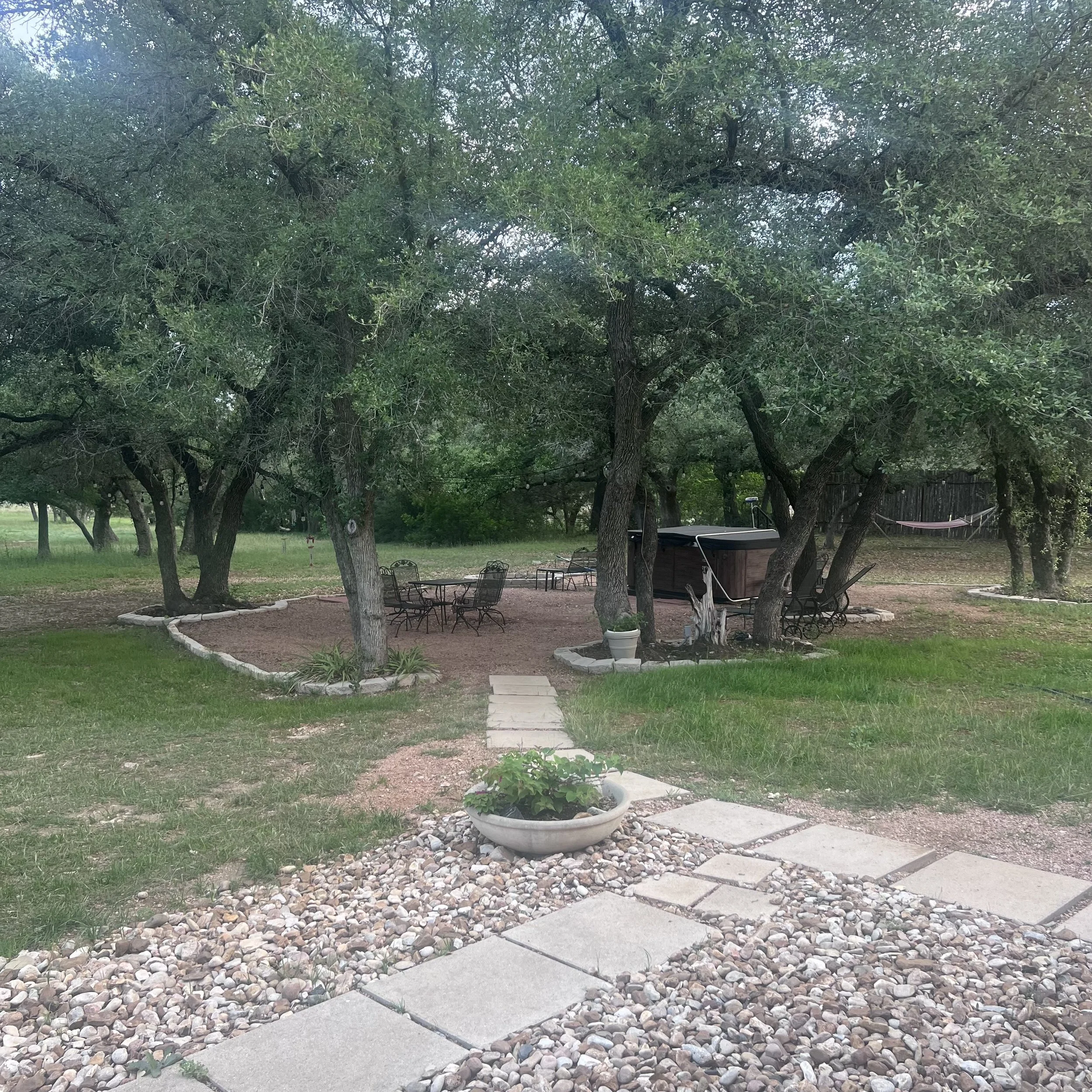 Separate outdoor living area with spa (negotiable).