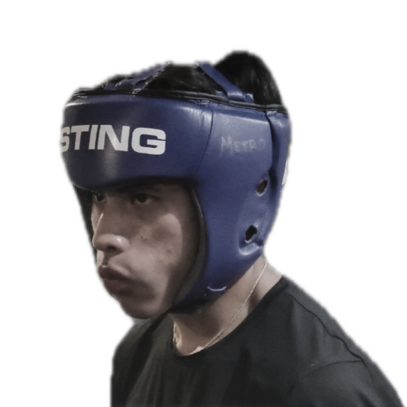 Amateur boxer Austin Castillo wearing blue competition headgear for a Parker's Place Boxing League (PPBL) bout.