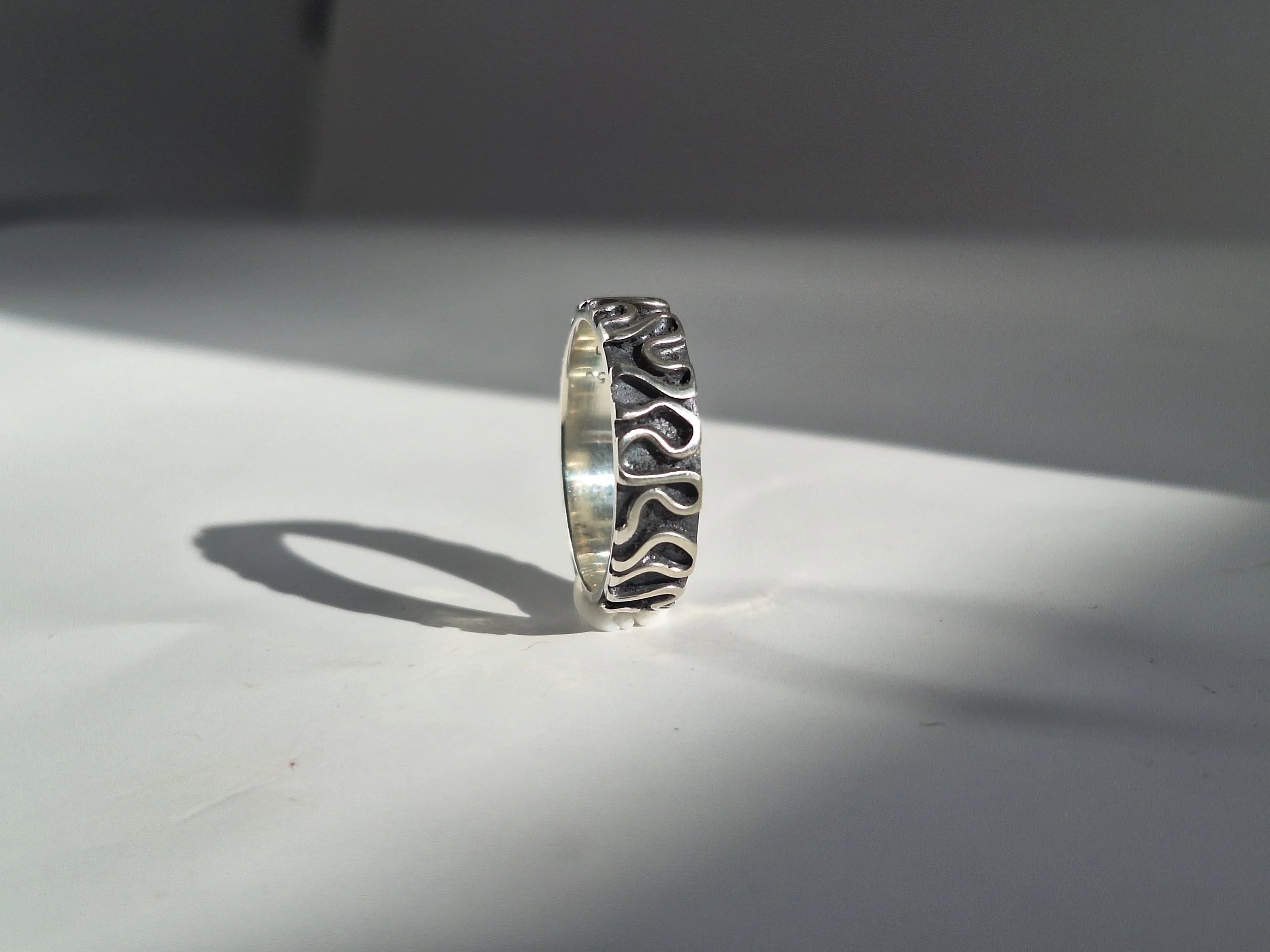 Anillo enredo externo banda