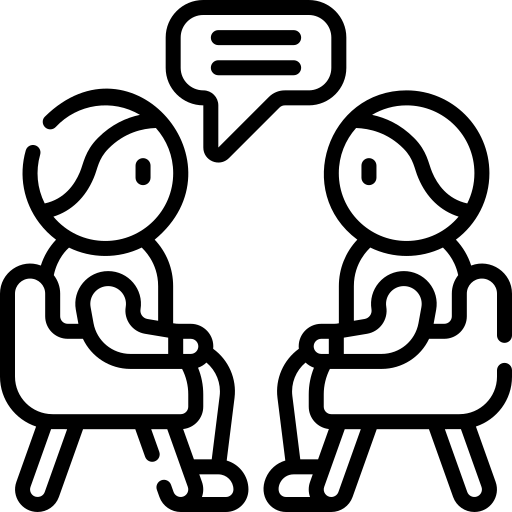 Schwarzes Symbol eines Kreuzes in einem Kreis sicher an einer Mauer befestigt.