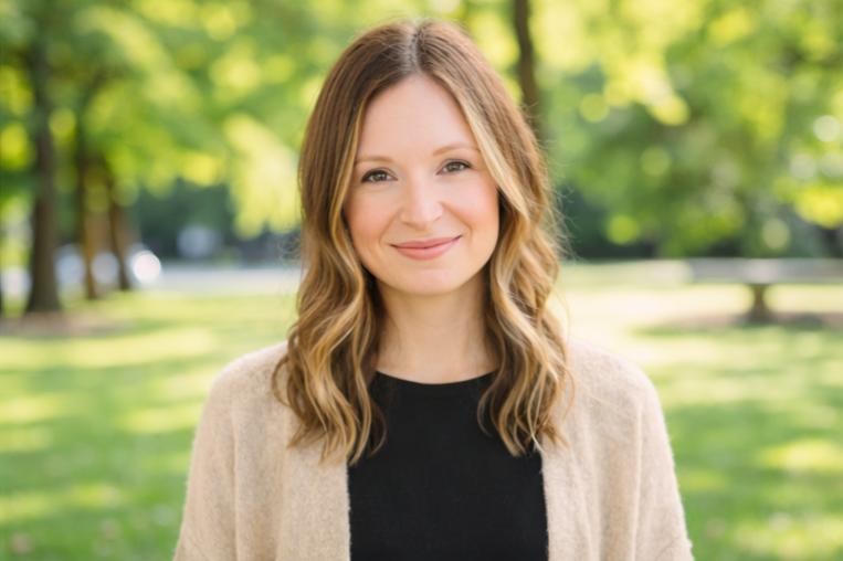 Woman smiling in park setting
