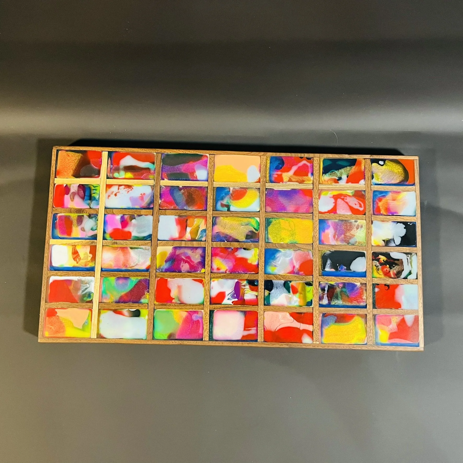 Multiple colored grid charcuterie board.