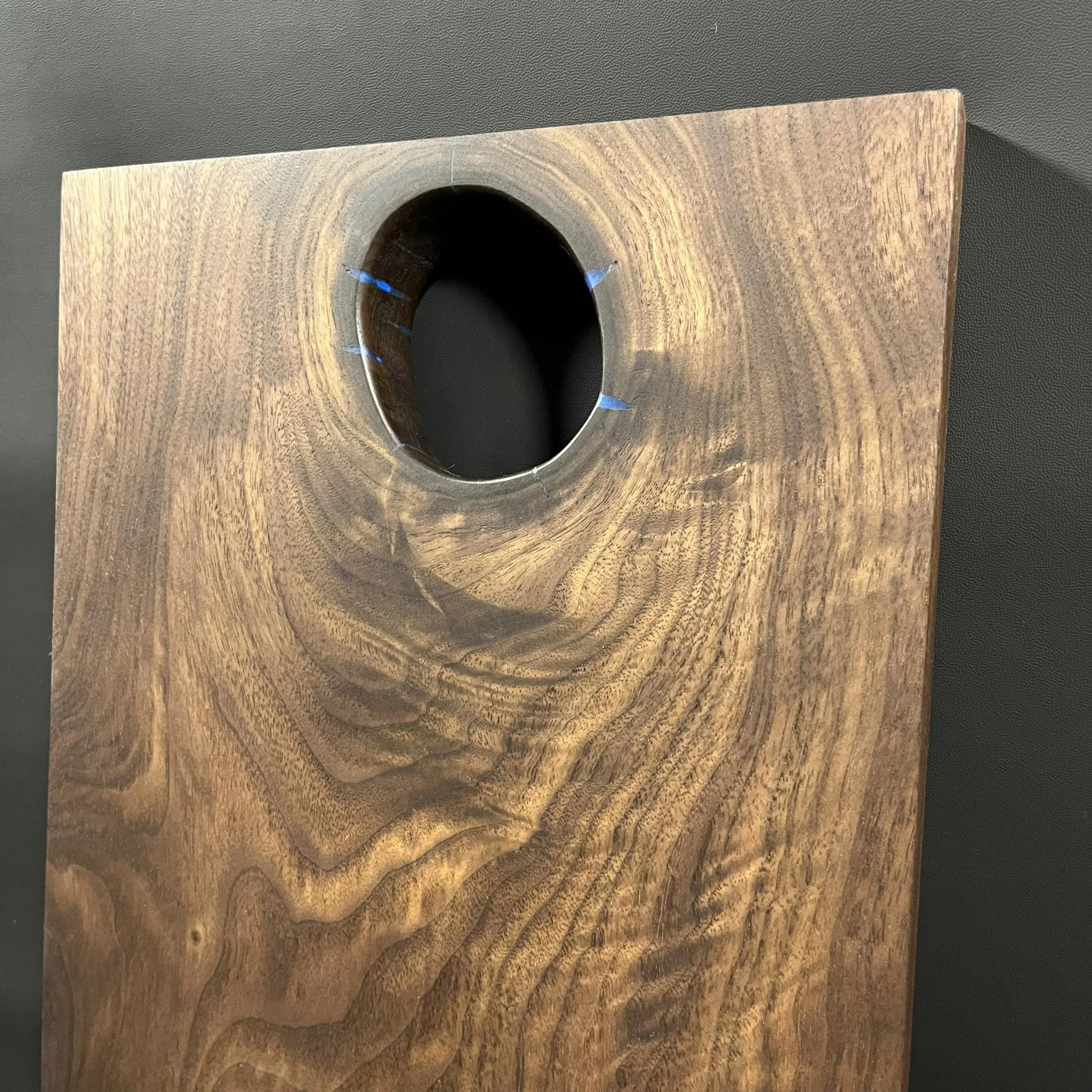 Built in handle with blue epoxy.