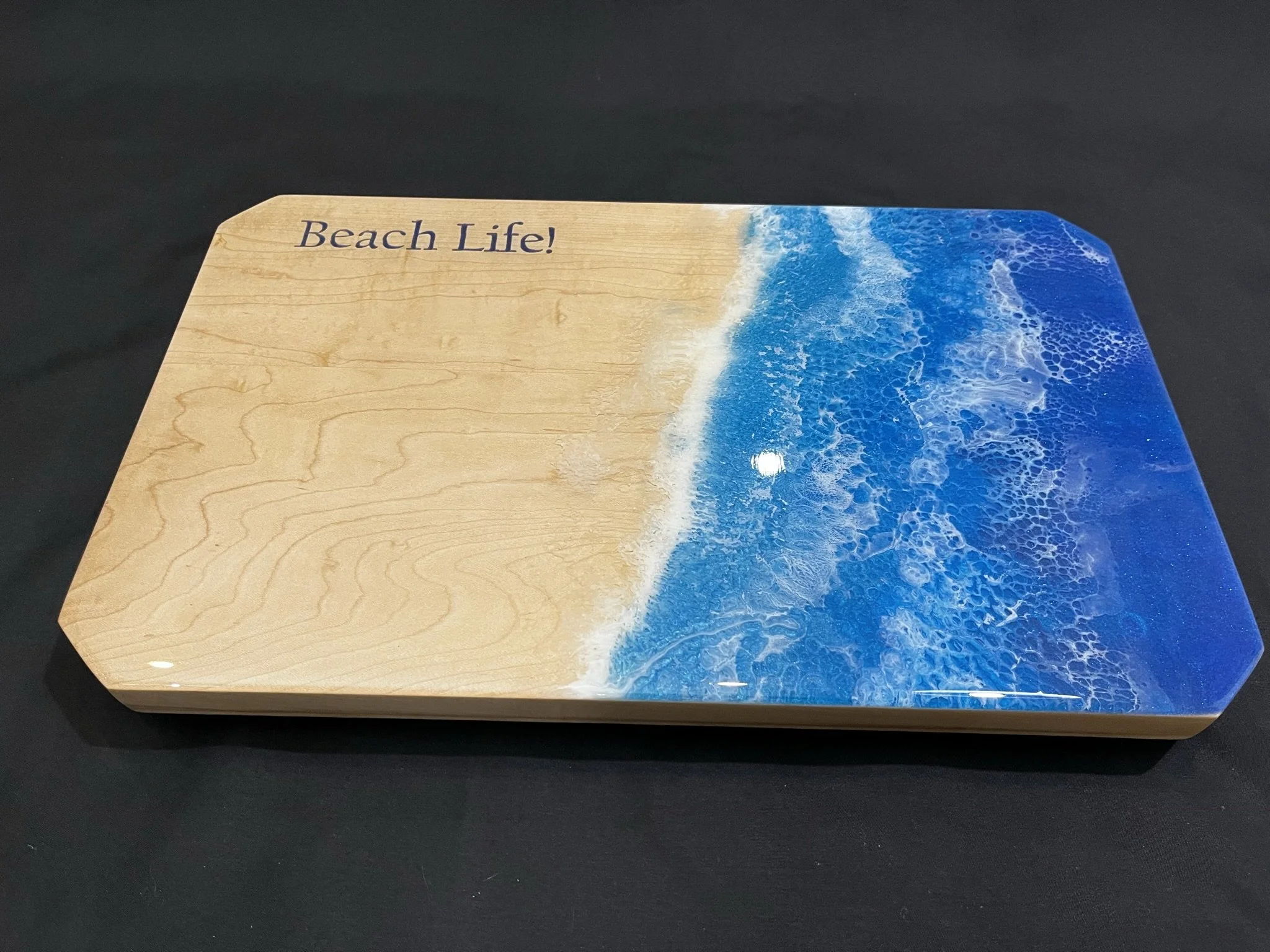 Maple board with beach epoxy design.