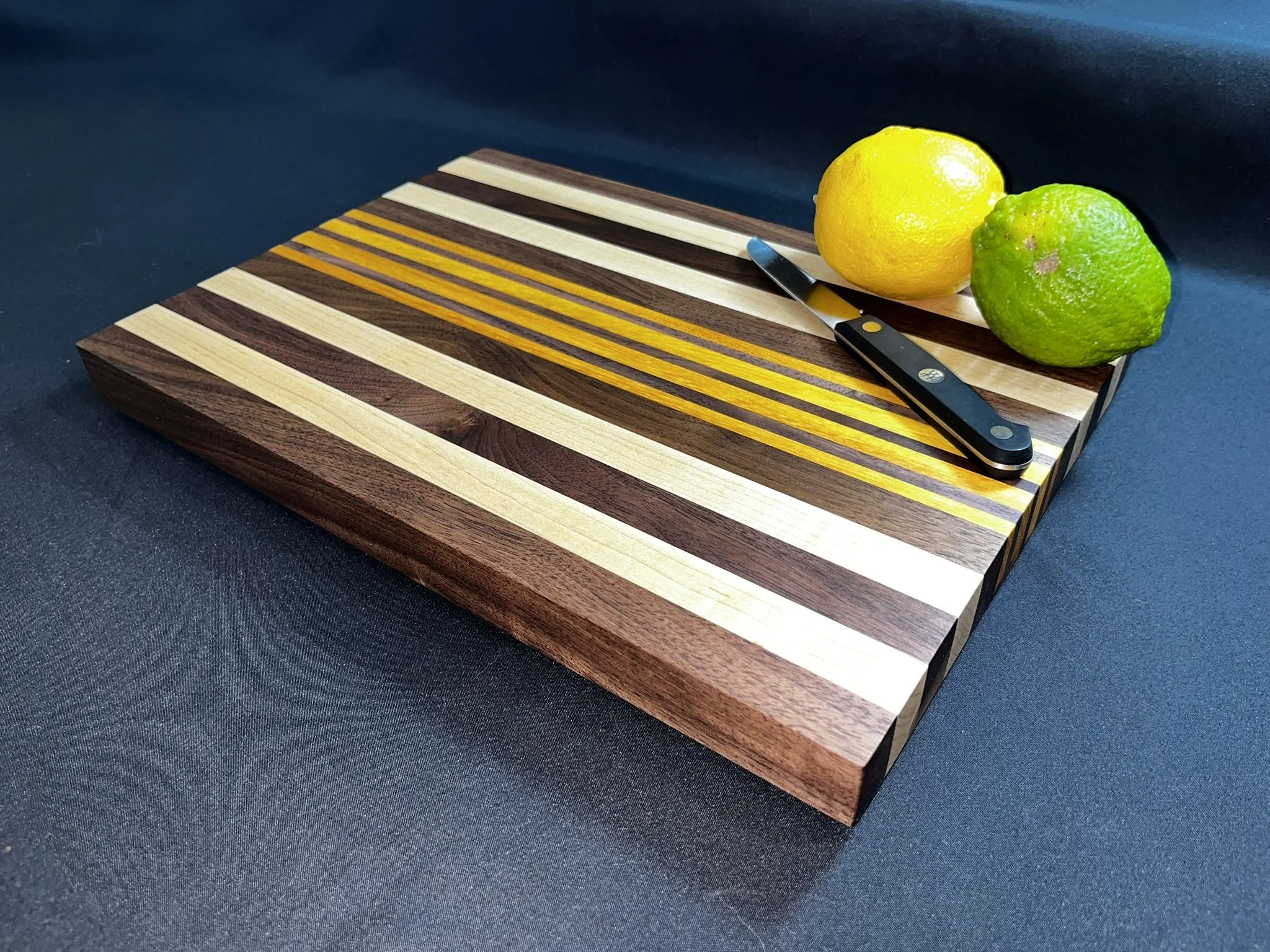 The Kickapoo made of walnut with maple and Osage orange accents.
